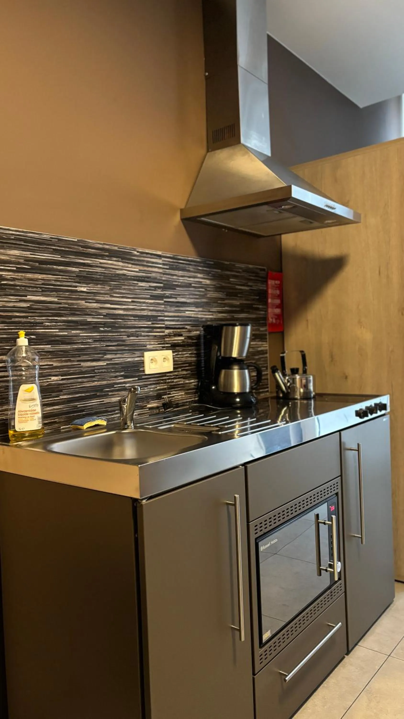 Kitchen or kitchenette in Hotel La Louve