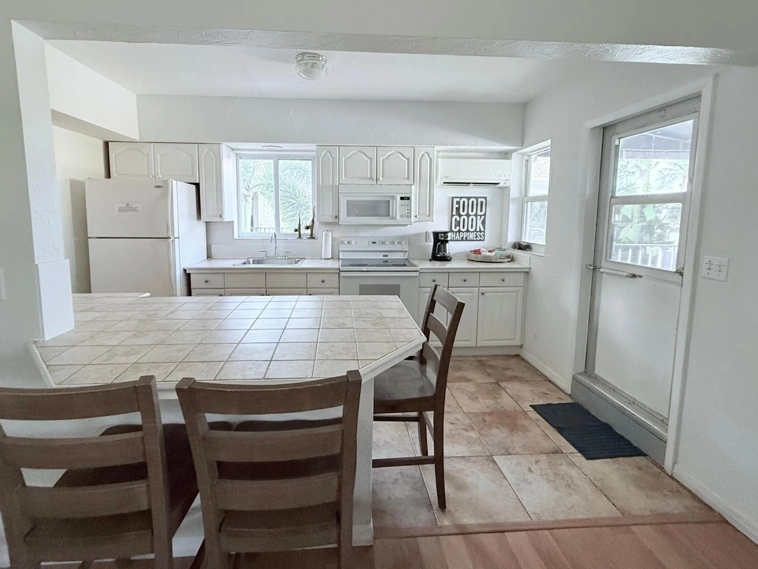 kitchen in 4145 By The Sea Inn & Suites