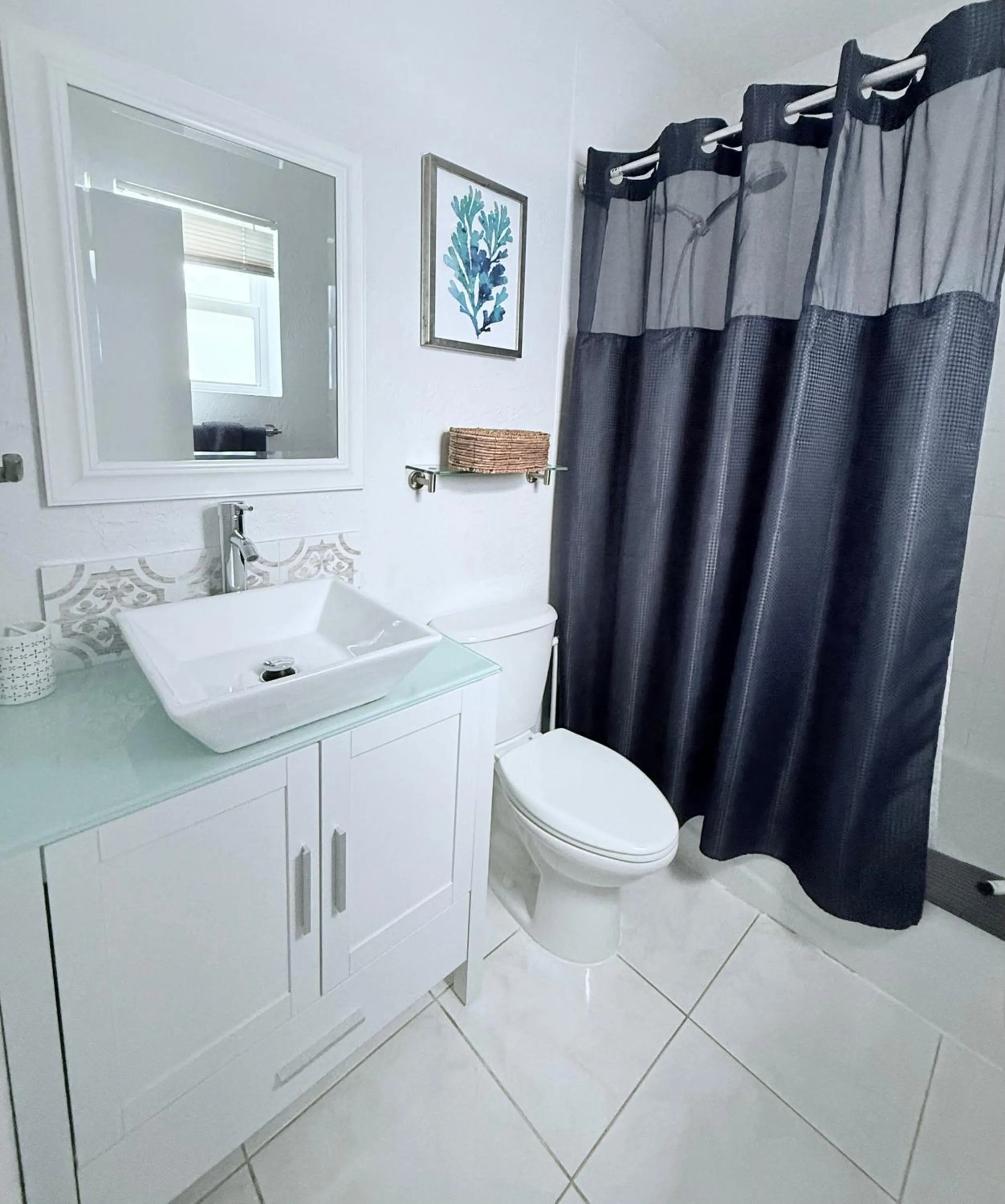 Bathroom in 4145 By The Sea Inn & Suites