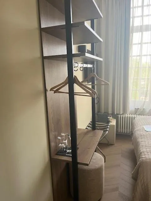 Seating area, Bed in Amaryllis Hotel Veurne