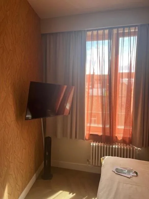 Bed in Amaryllis Hotel Veurne