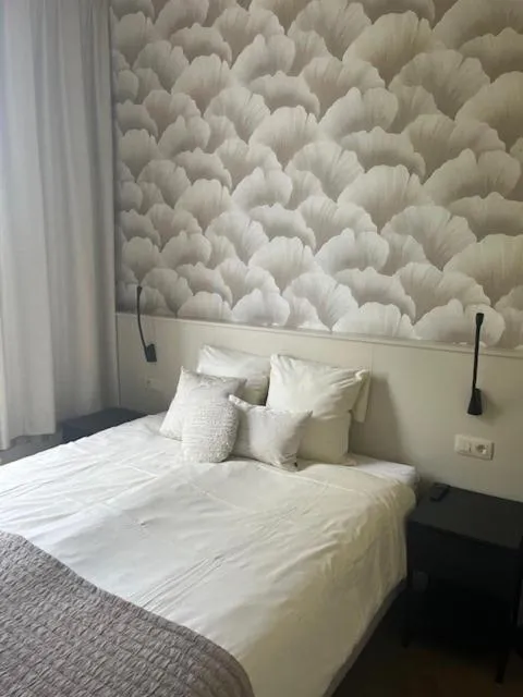 Bed in Amaryllis Hotel Veurne
