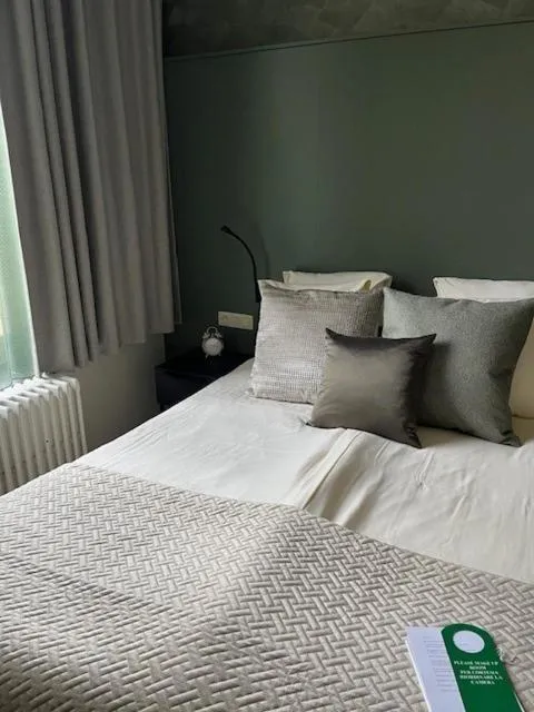 Bed in Amaryllis Hotel Veurne