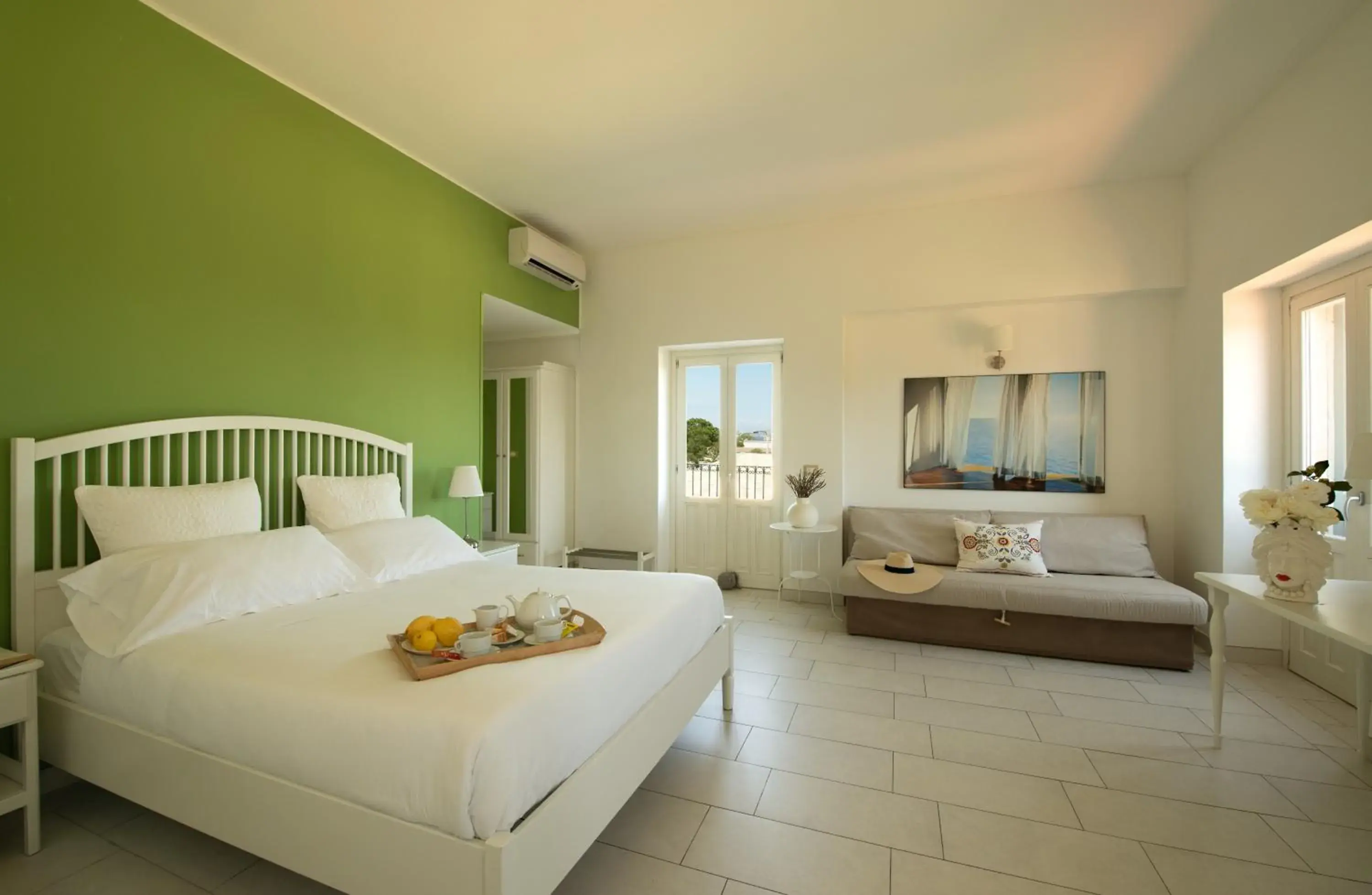 King Room with Sea View in Isola Charm B&B - A Historic Villa near Punta Del Pero Beach King Room with Sea View in Isola Charm B&B - A Historic Villa near Punta Del Pero Beach