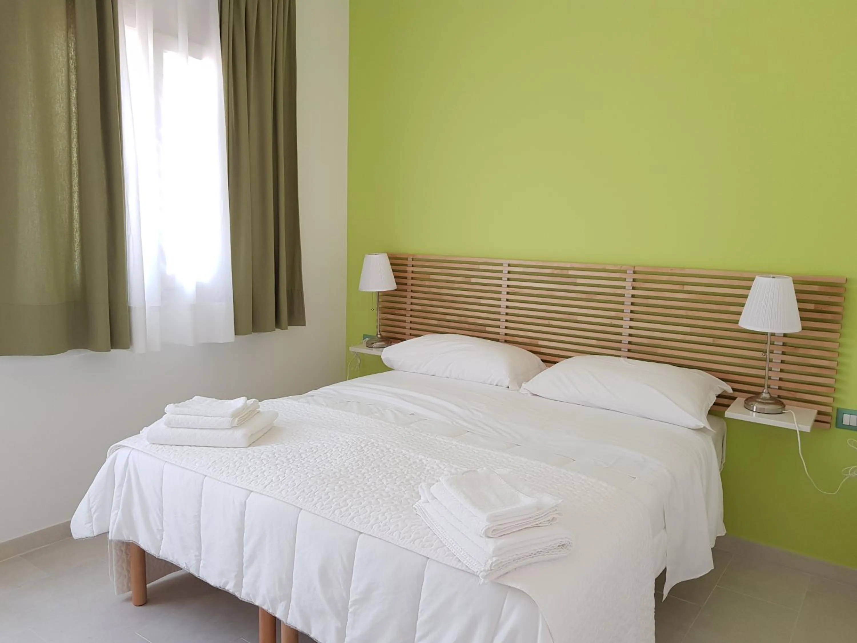 Bed in Isola Charm B&B - Pool & Nature Stay
