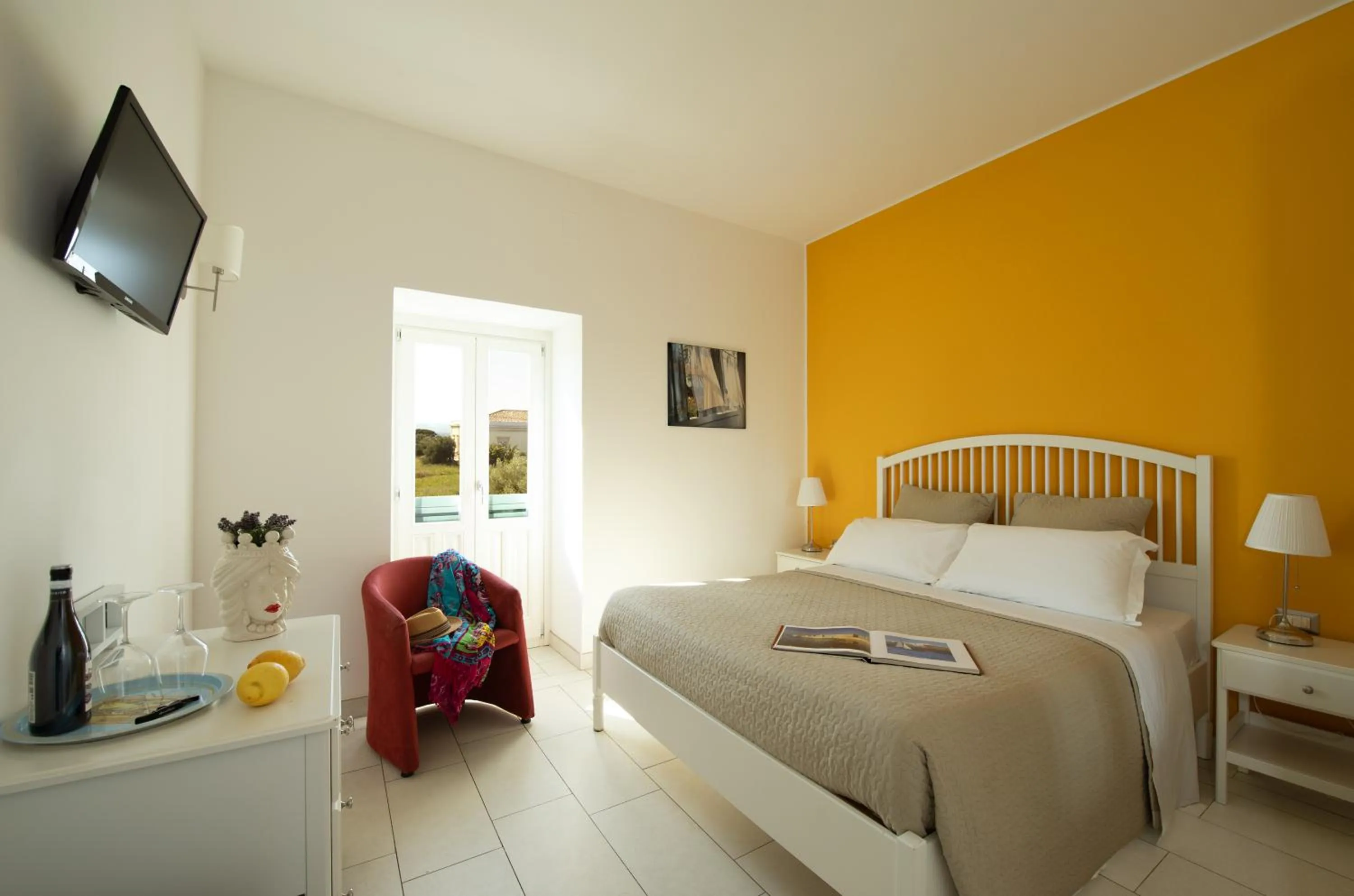 Communal lounge/ TV room, Bed in Isola Charm B&B - Pool & Nature Stay