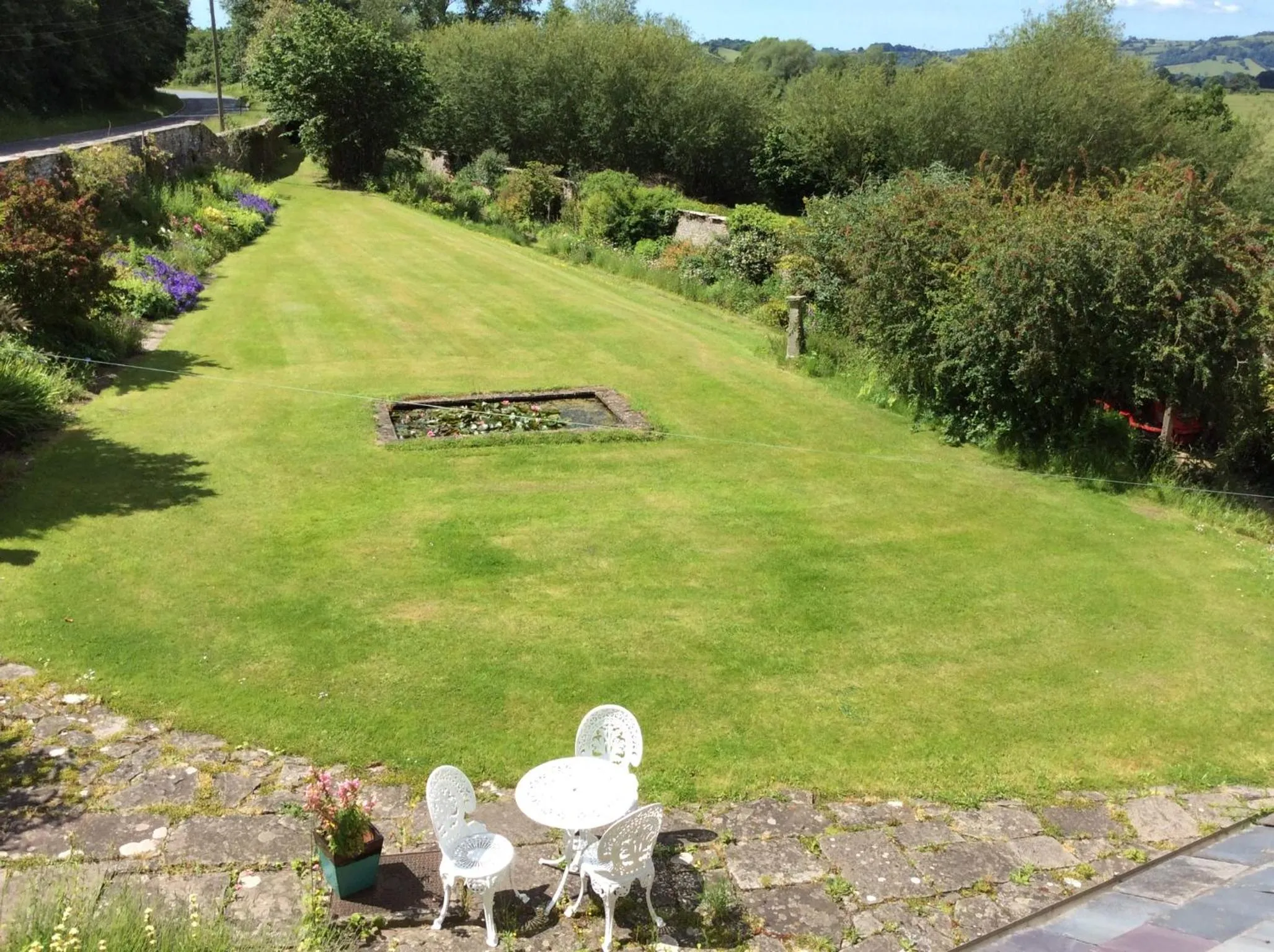 Garden view in Aberllynfi Riverside Guest House