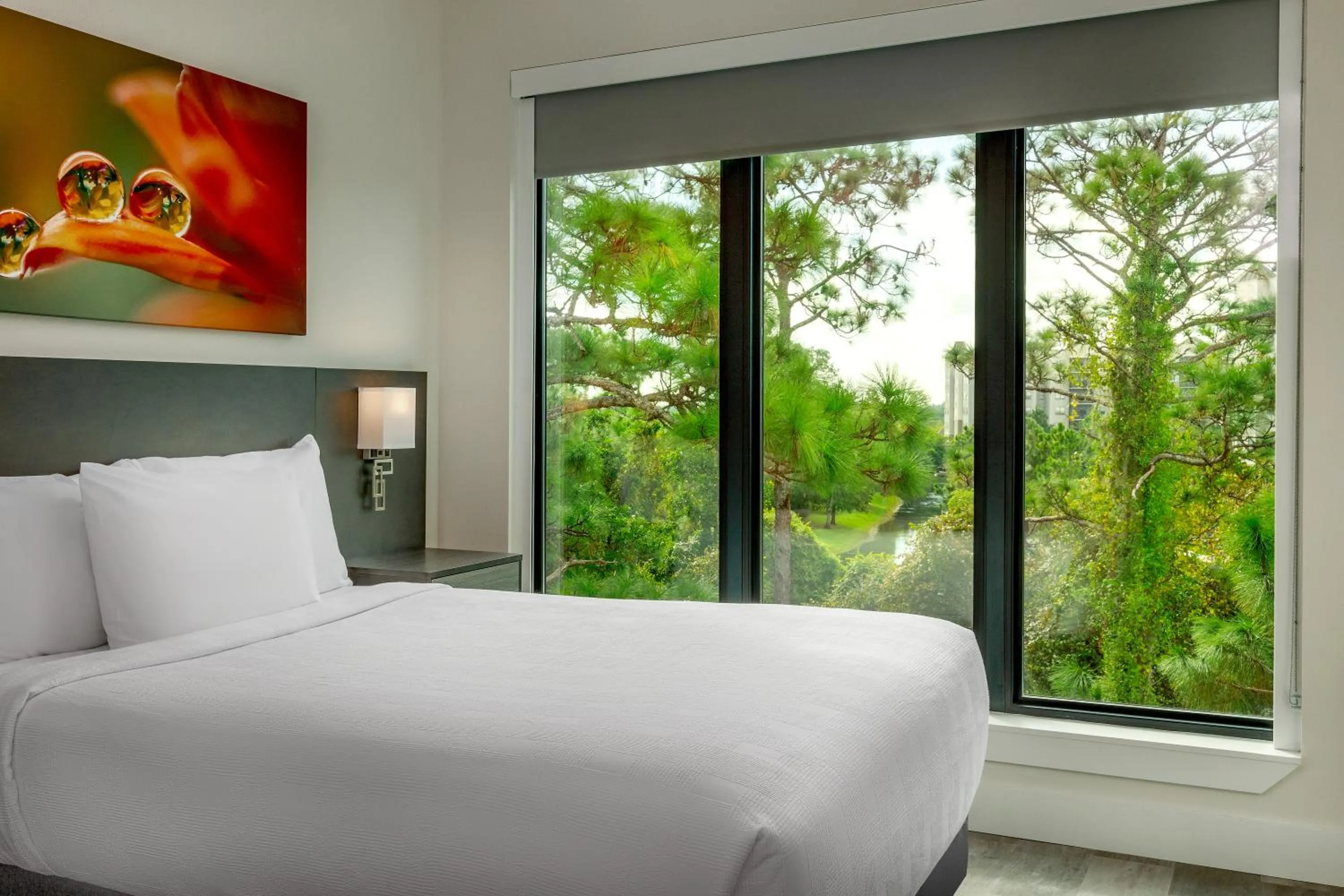 Bedroom, Bed in The Grove Resort & Water Park Orlando