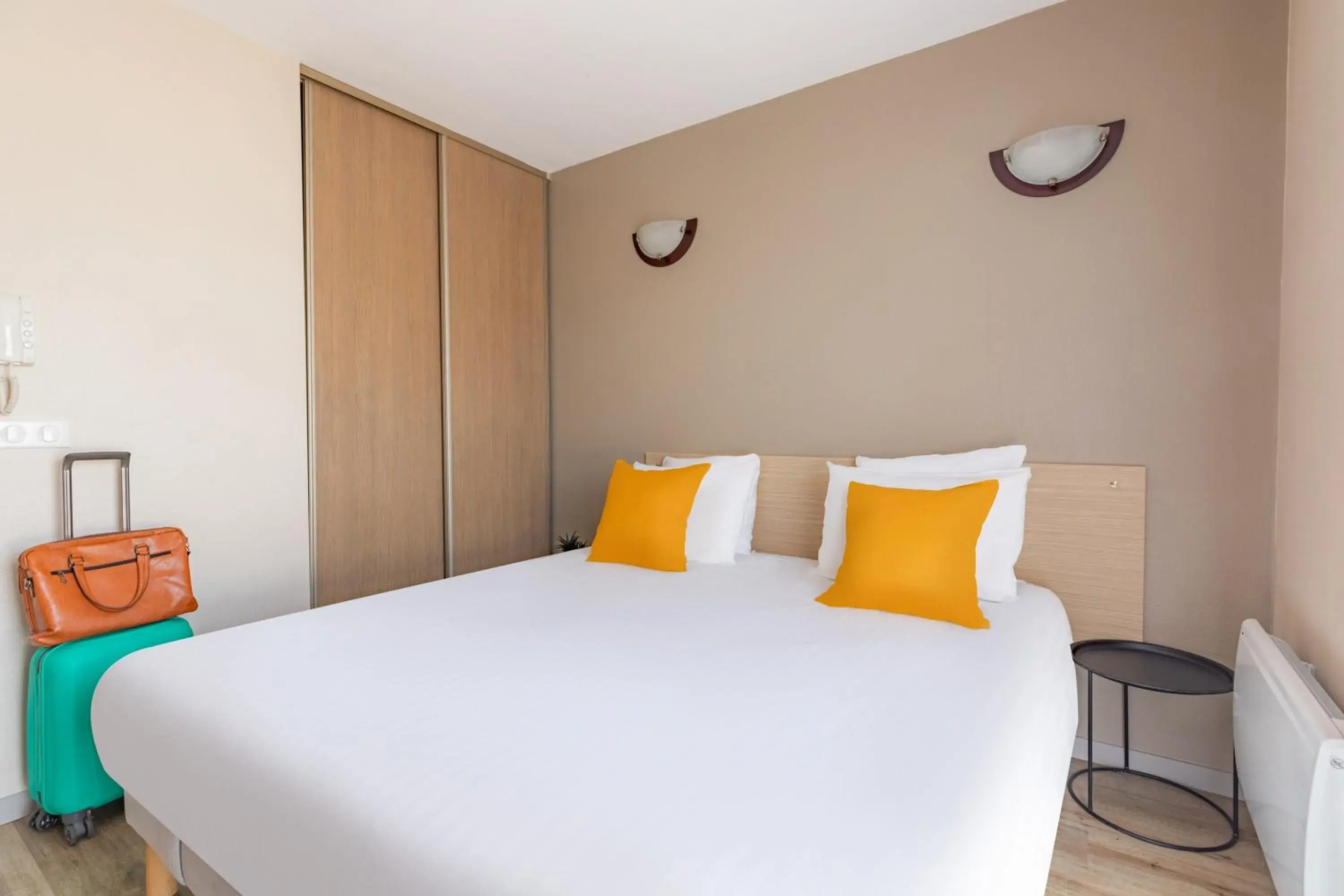 Photo of the whole room, Bed in Appart'City Classic Arlon - Porte du Luxembourg Photo of the whole room, Bed in Appart'City Classic Arlon - Porte du Luxembourg