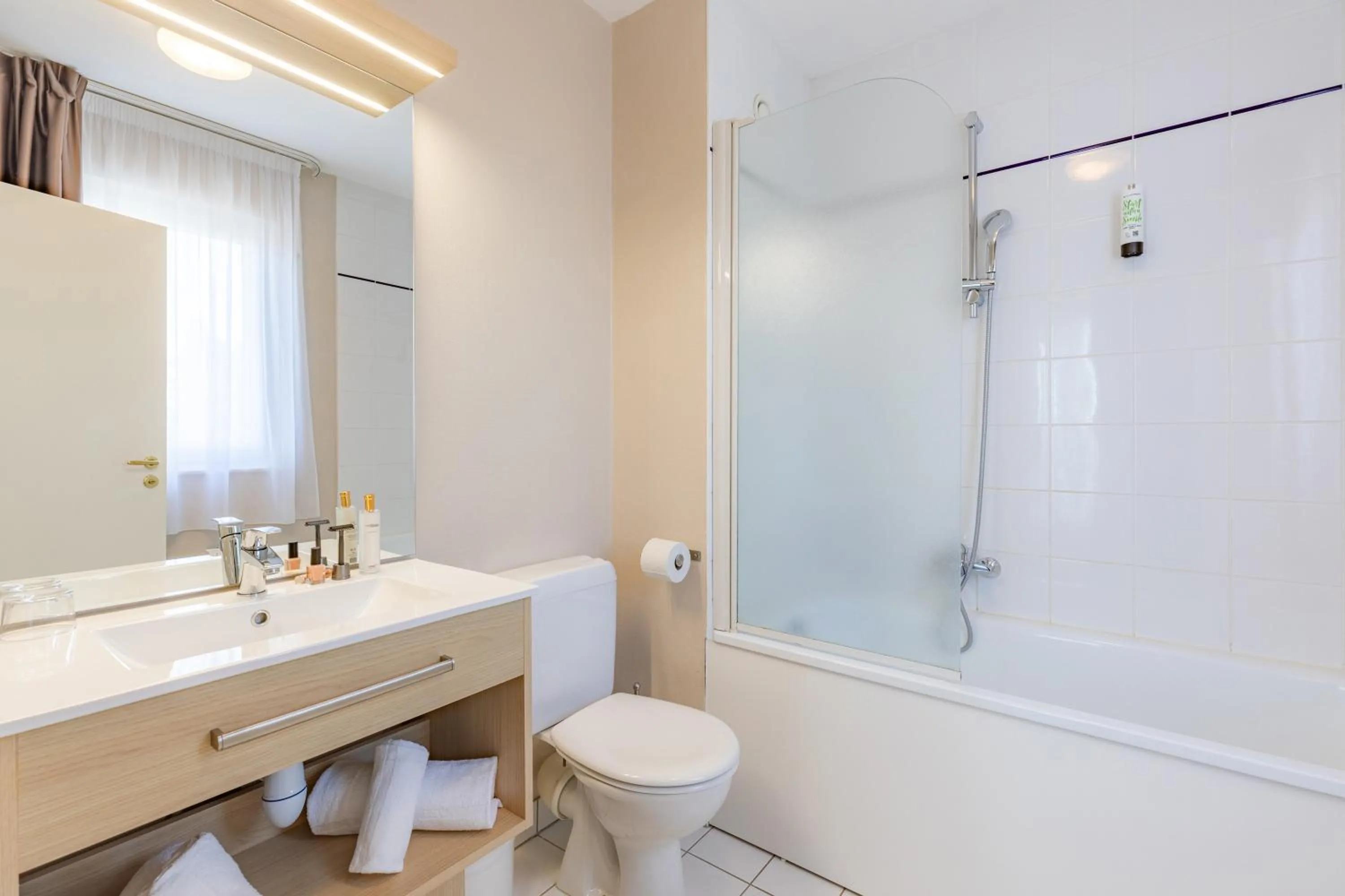 Bathroom in Appart'City Classic Arlon - Porte du Luxembourg