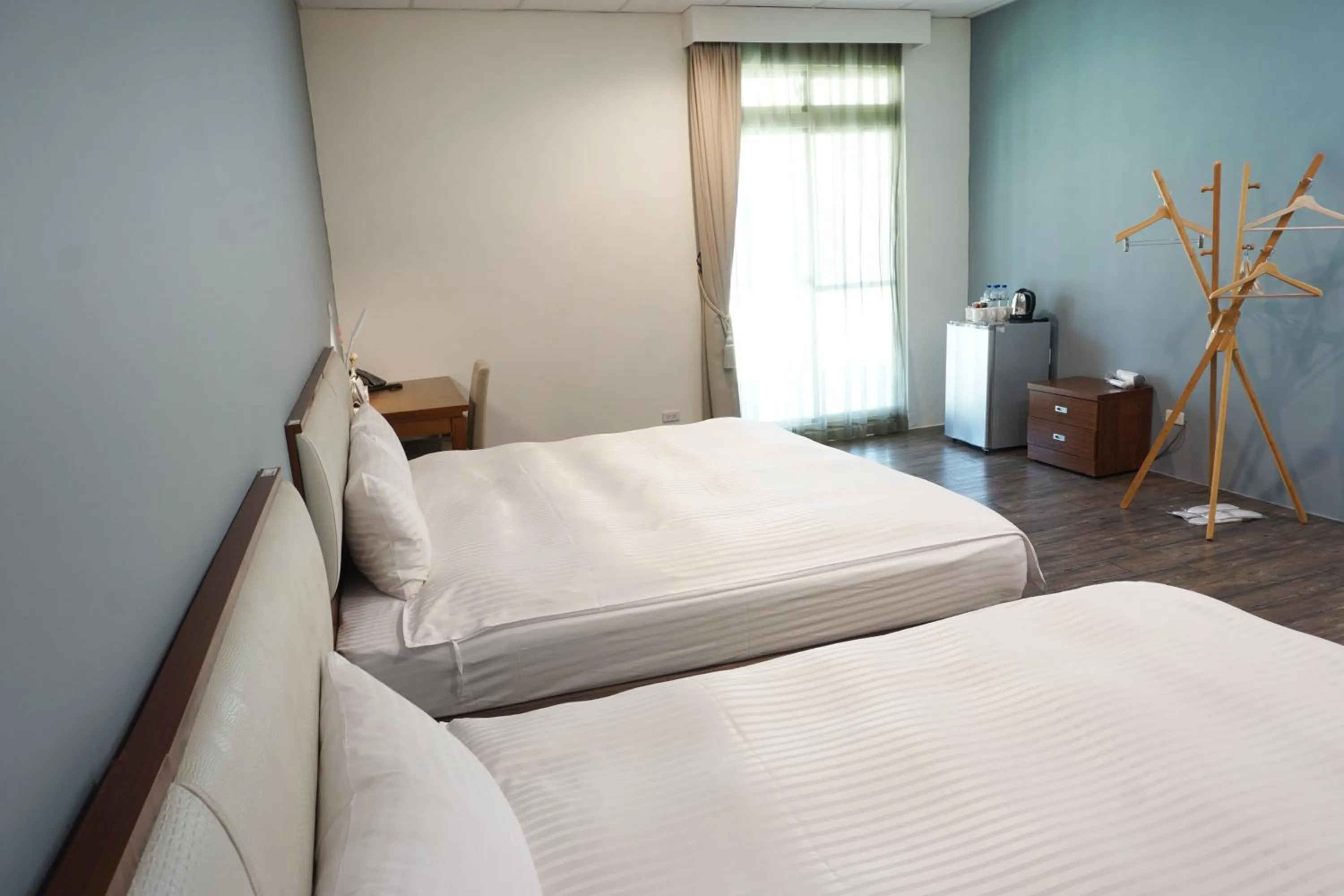 Bed in NCNU Campus Inn暨大行旅