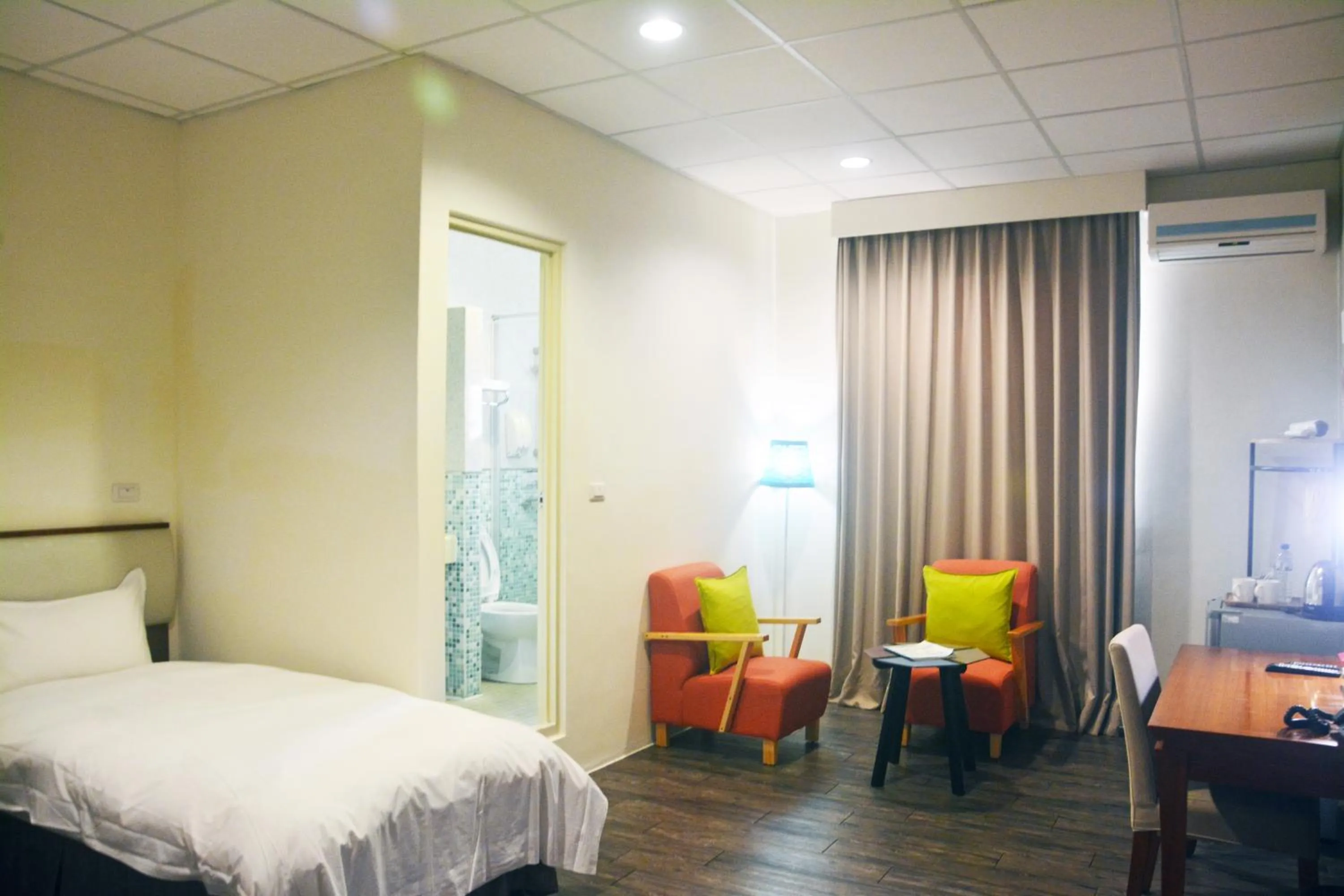 Bed in NCNU Campus Inn暨大行旅