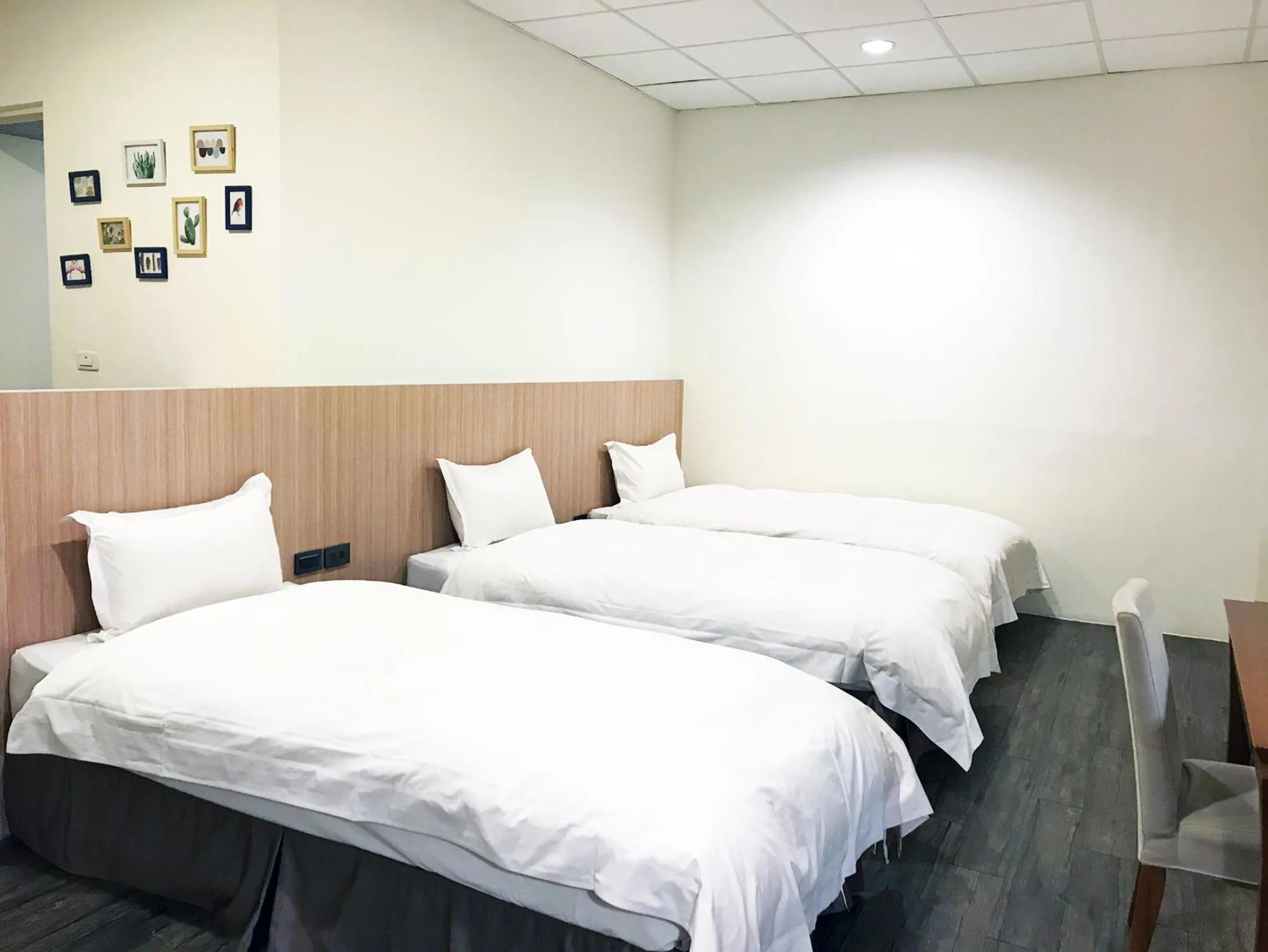 Bed in NCNU Campus Inn暨大行旅
