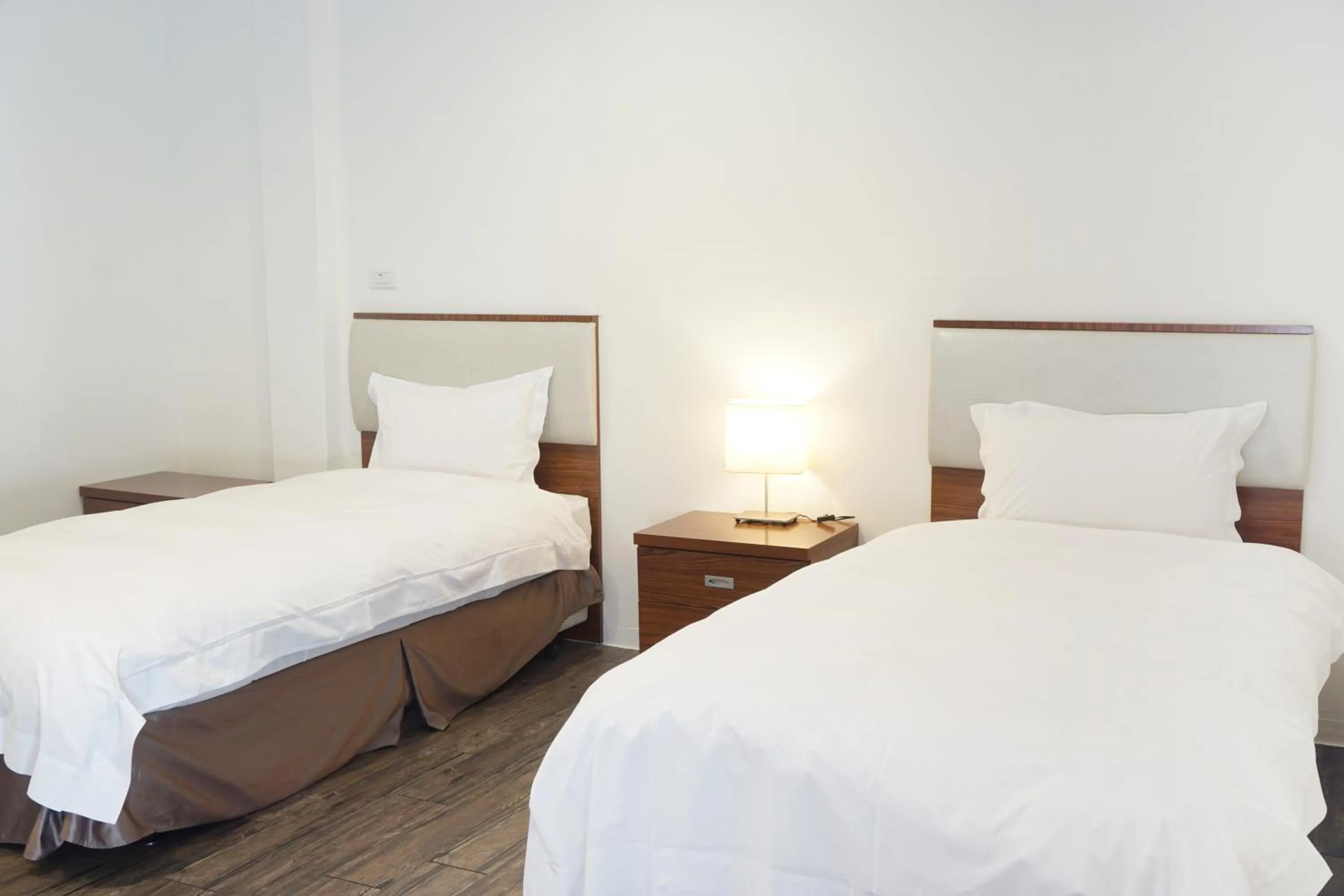 Bed in NCNU Campus Inn暨大行旅