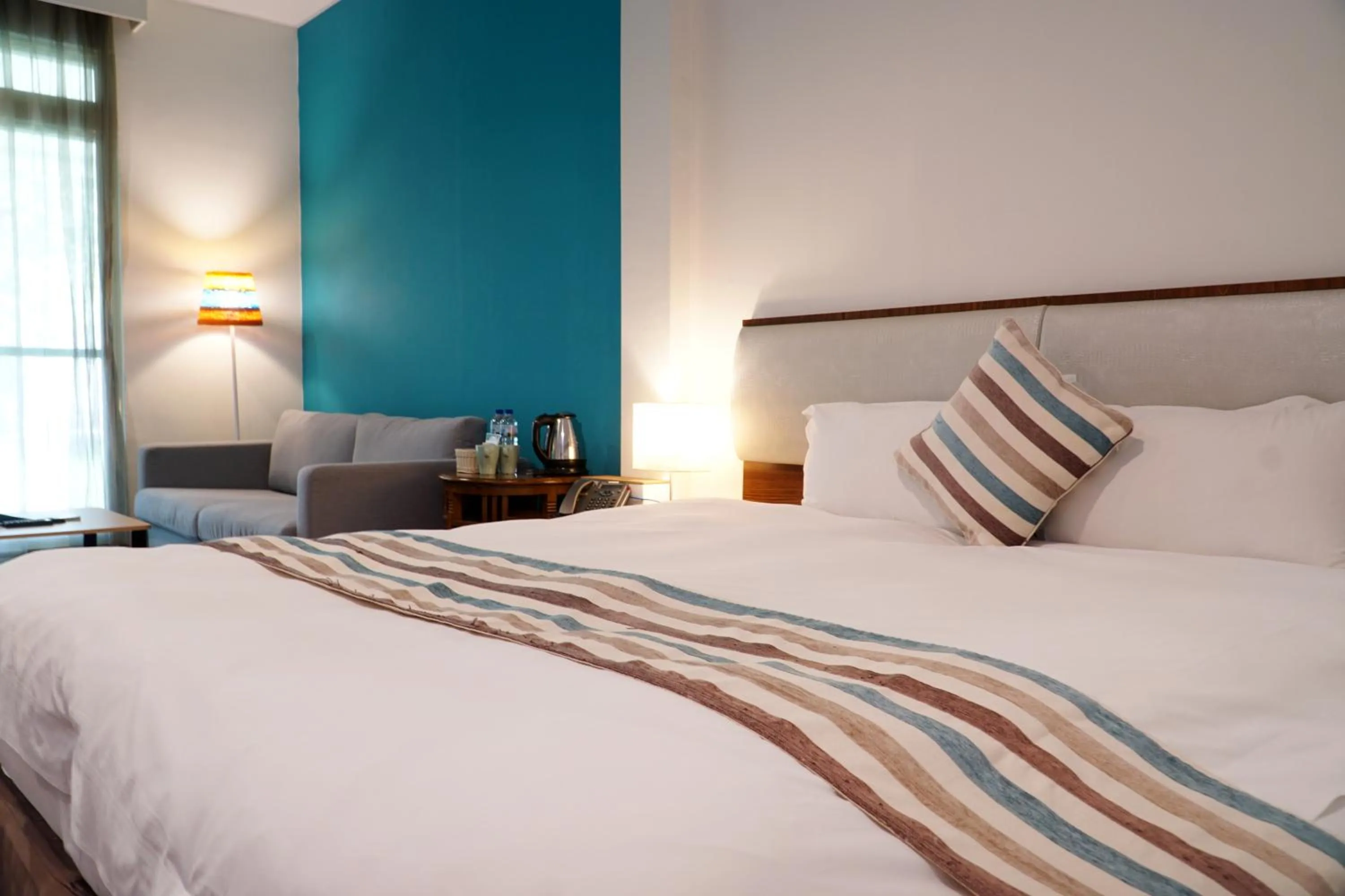 Bed in NCNU Campus Inn暨大行旅