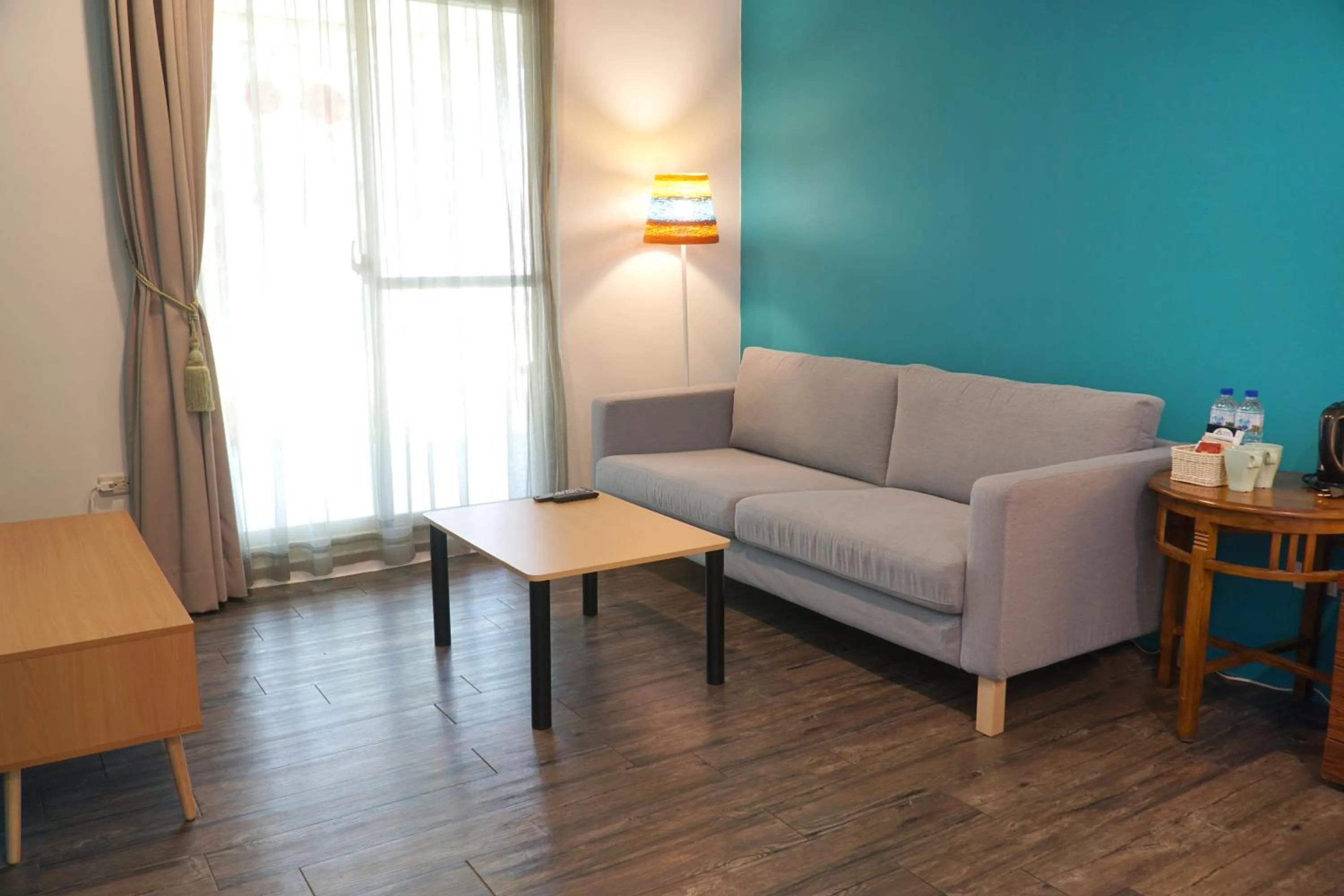 Living room in NCNU Campus Inn暨大行旅