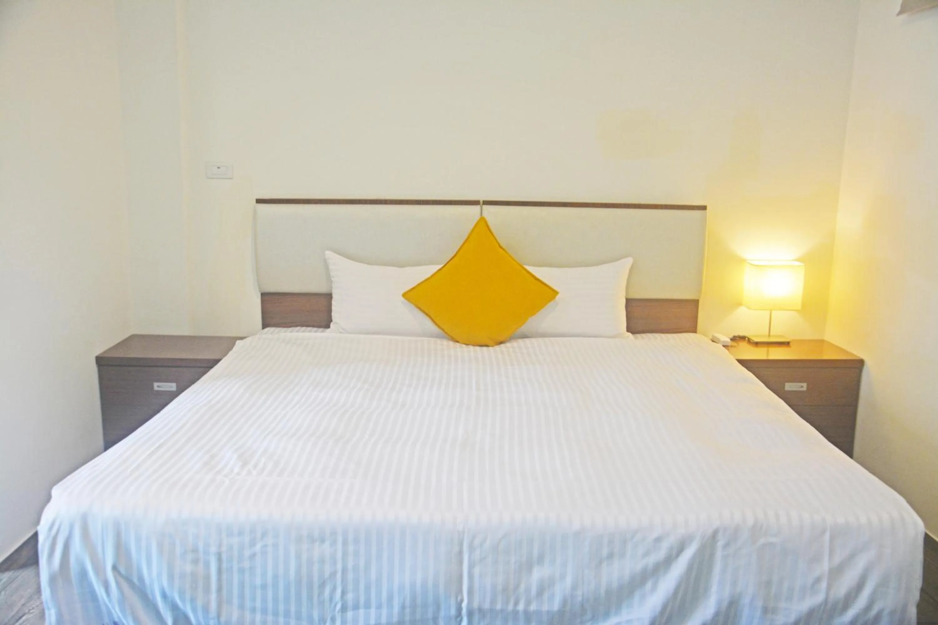 Bed in NCNU Campus Inn暨大行旅