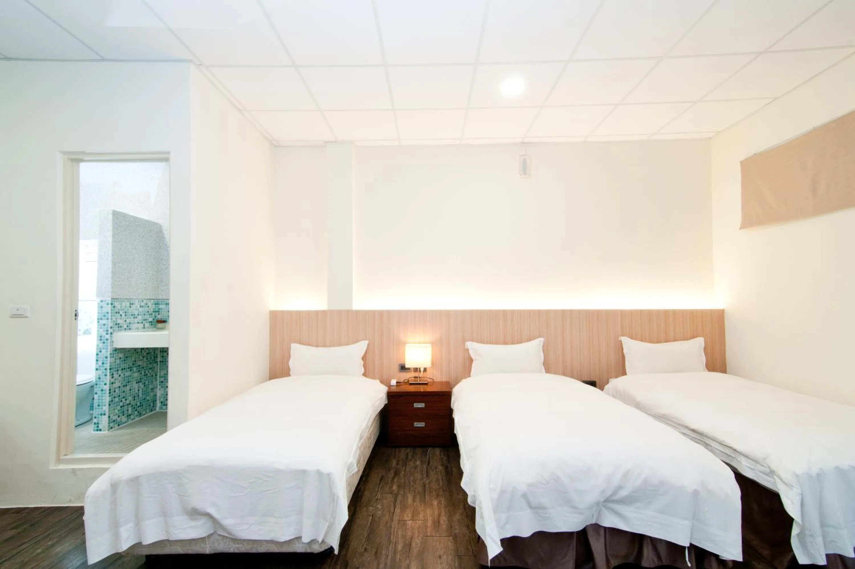 Bed in NCNU Campus Inn暨大行旅