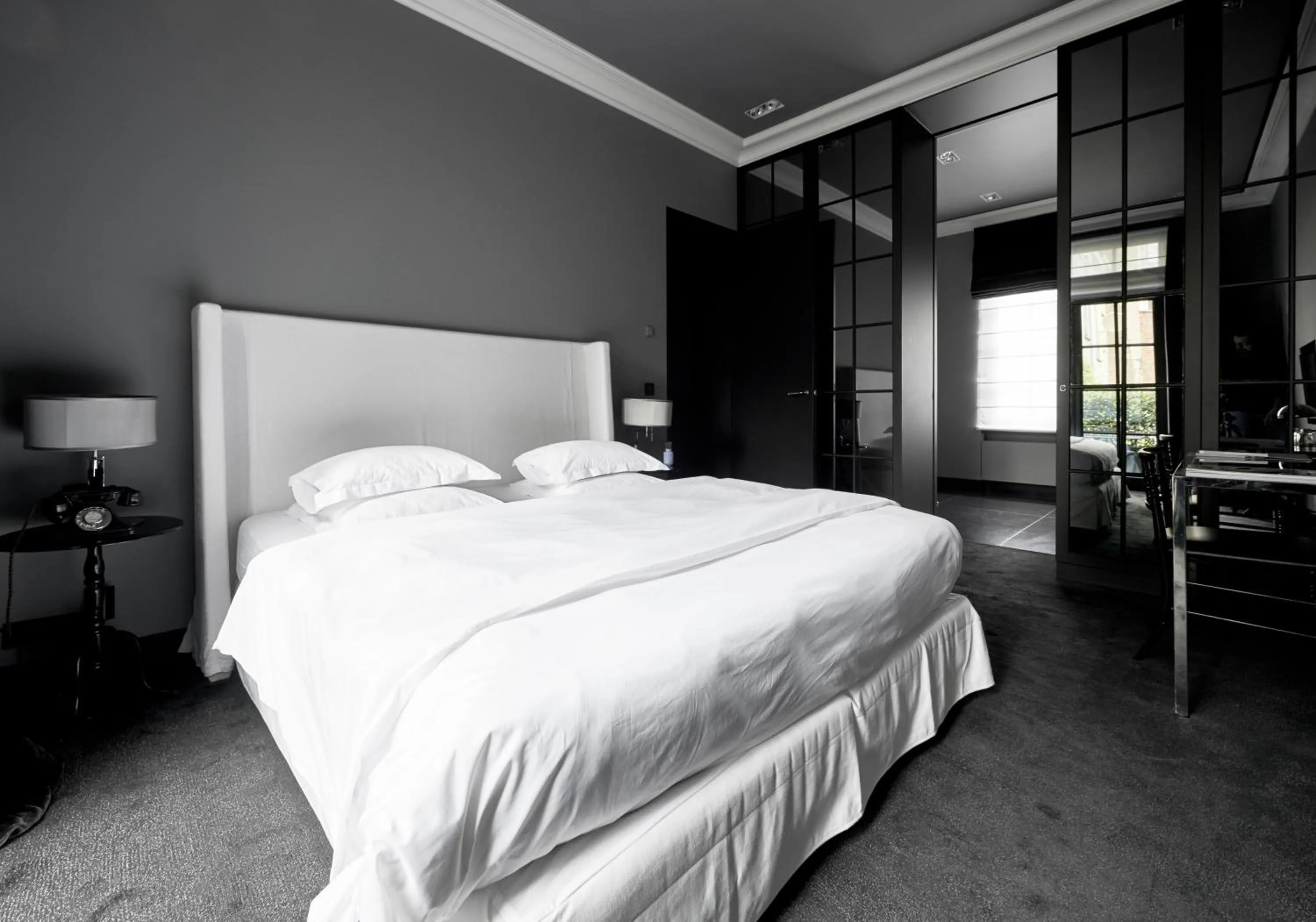 Bed in Hotel Odette en Ville