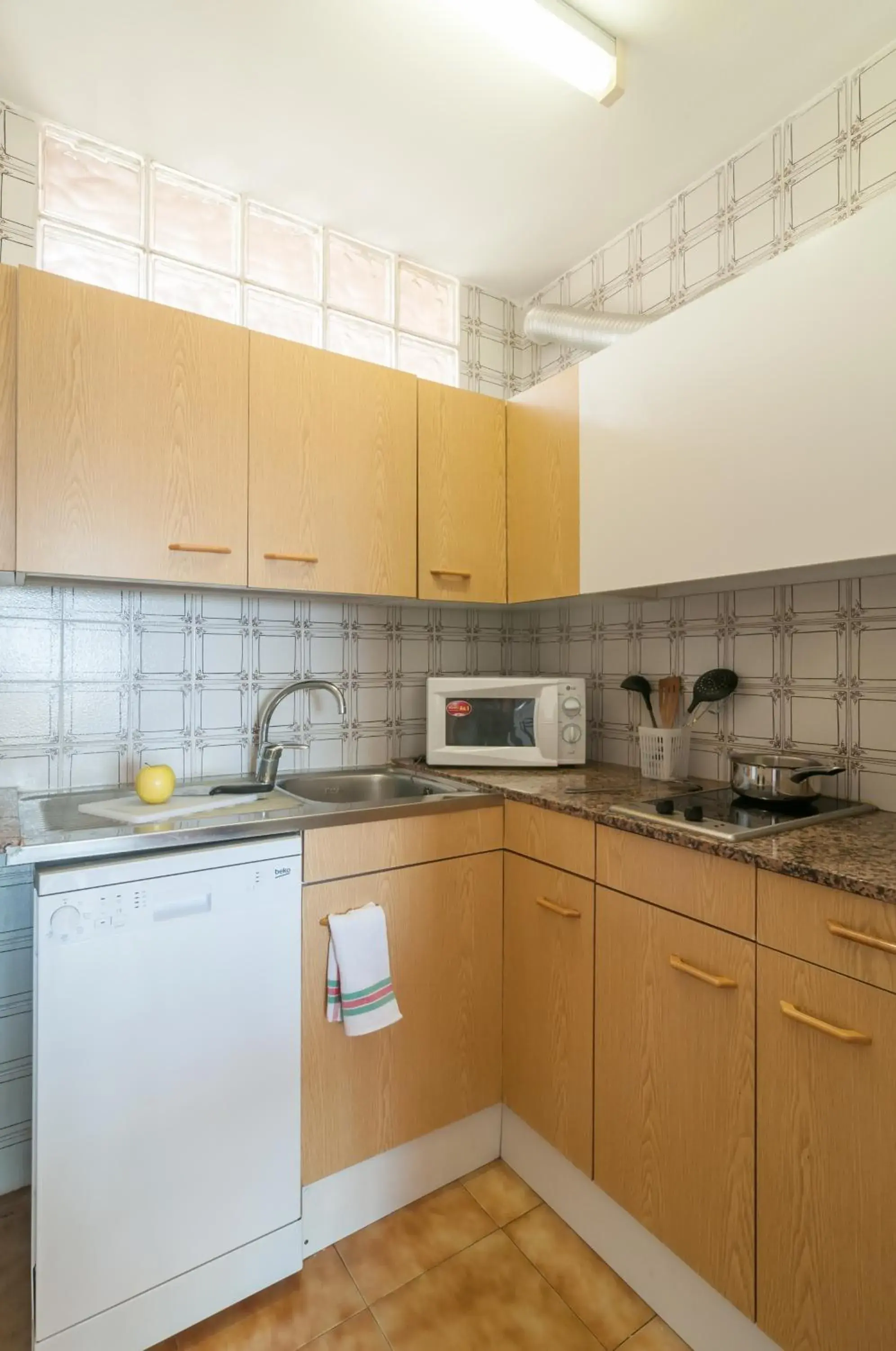 Kitchen or kitchenette in Pierre & Vacances Comarruga Kitchen or kitchenette in Pierre & Vacances Comarruga