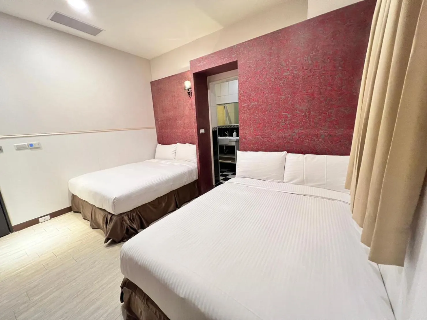 Bed in Kaishen Hotel