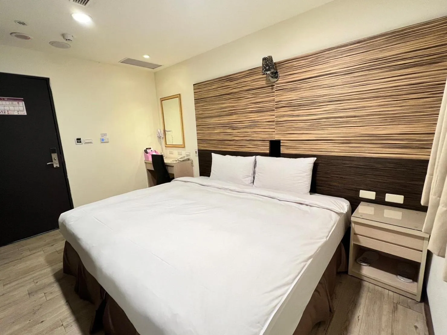 Bed in Kaishen Hotel