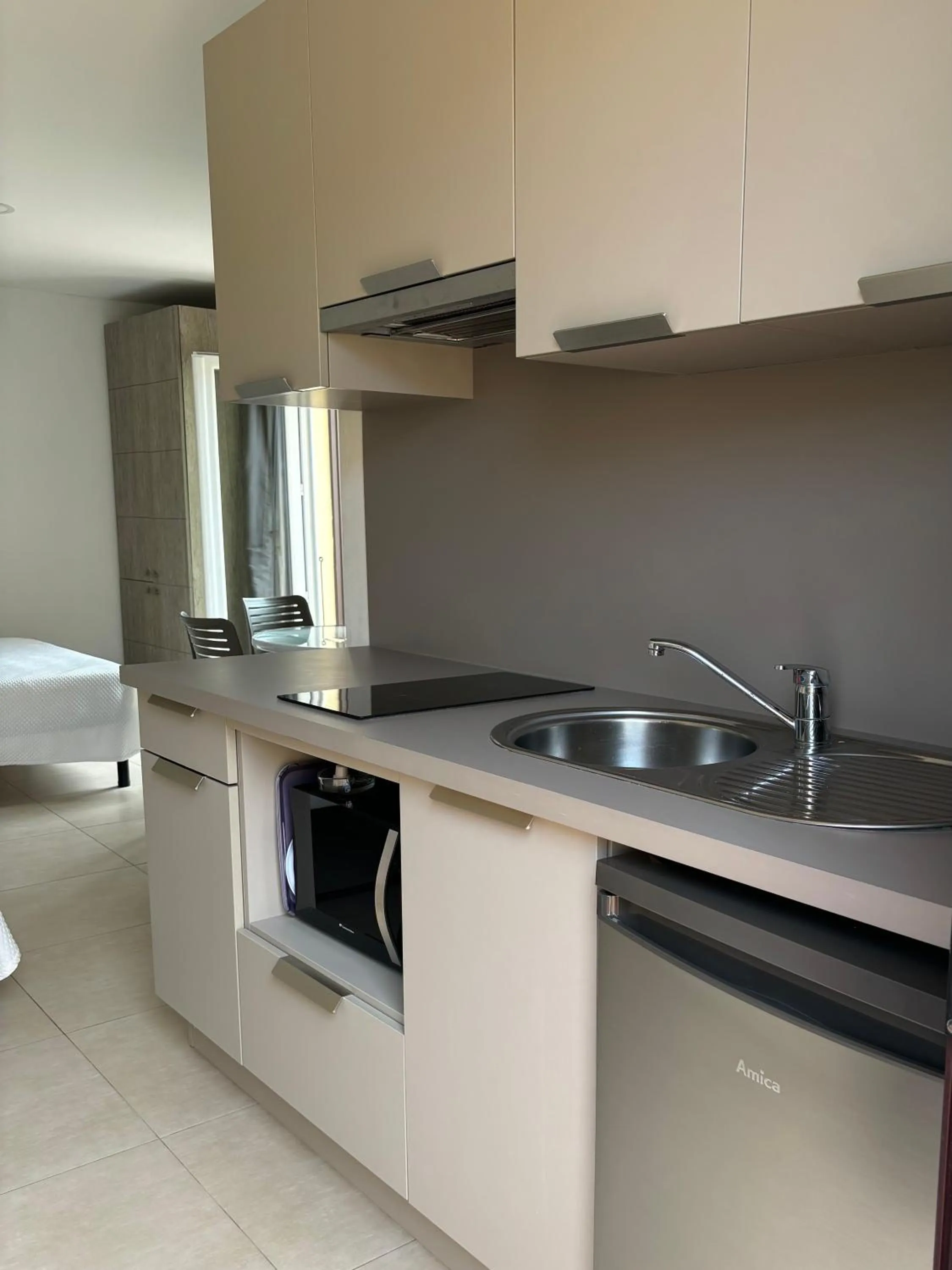 kitchen in Hôtel et Résidence Ta Kladia - Omigna