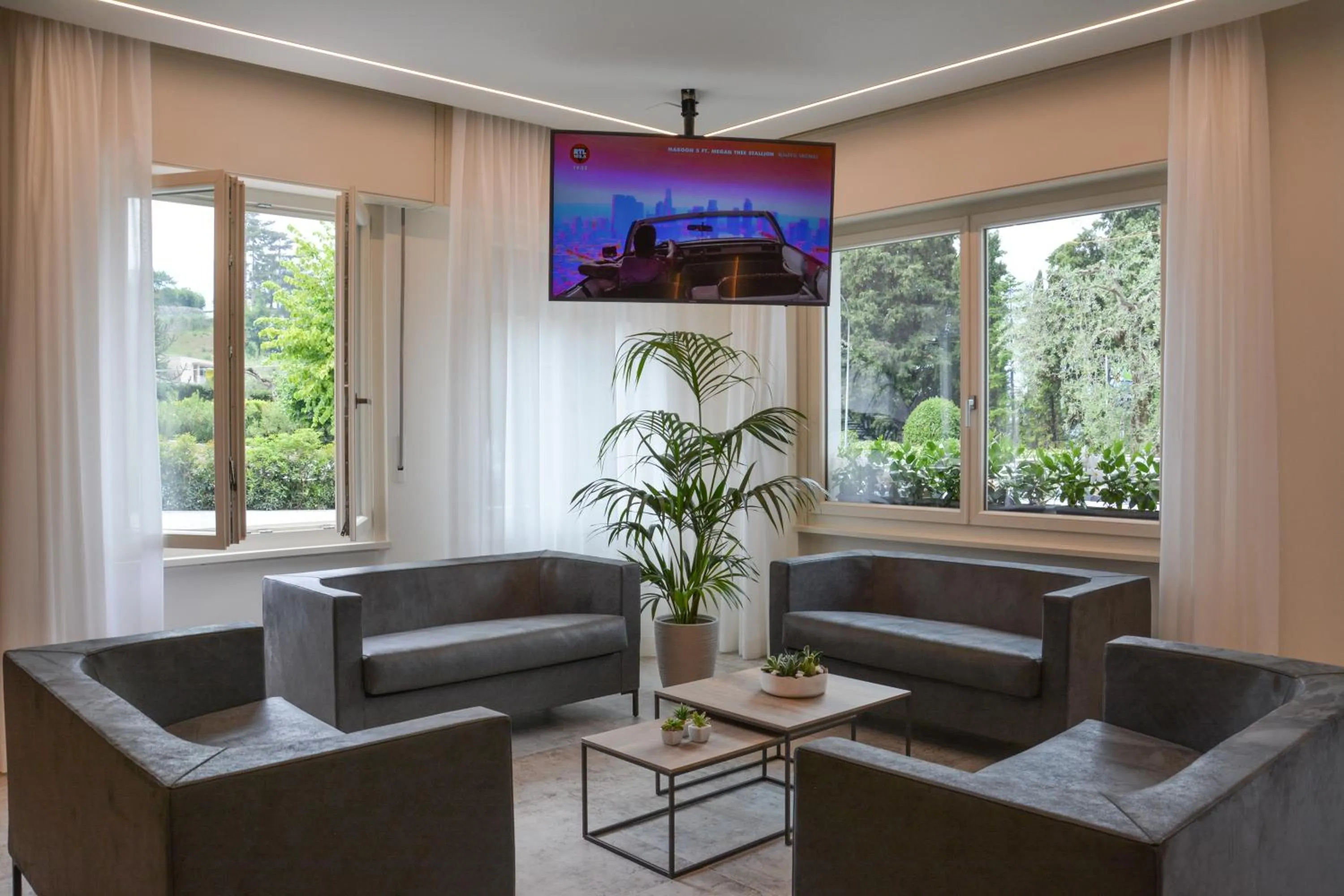 Communal lounge/ TV room in Hotel Stella Alpina