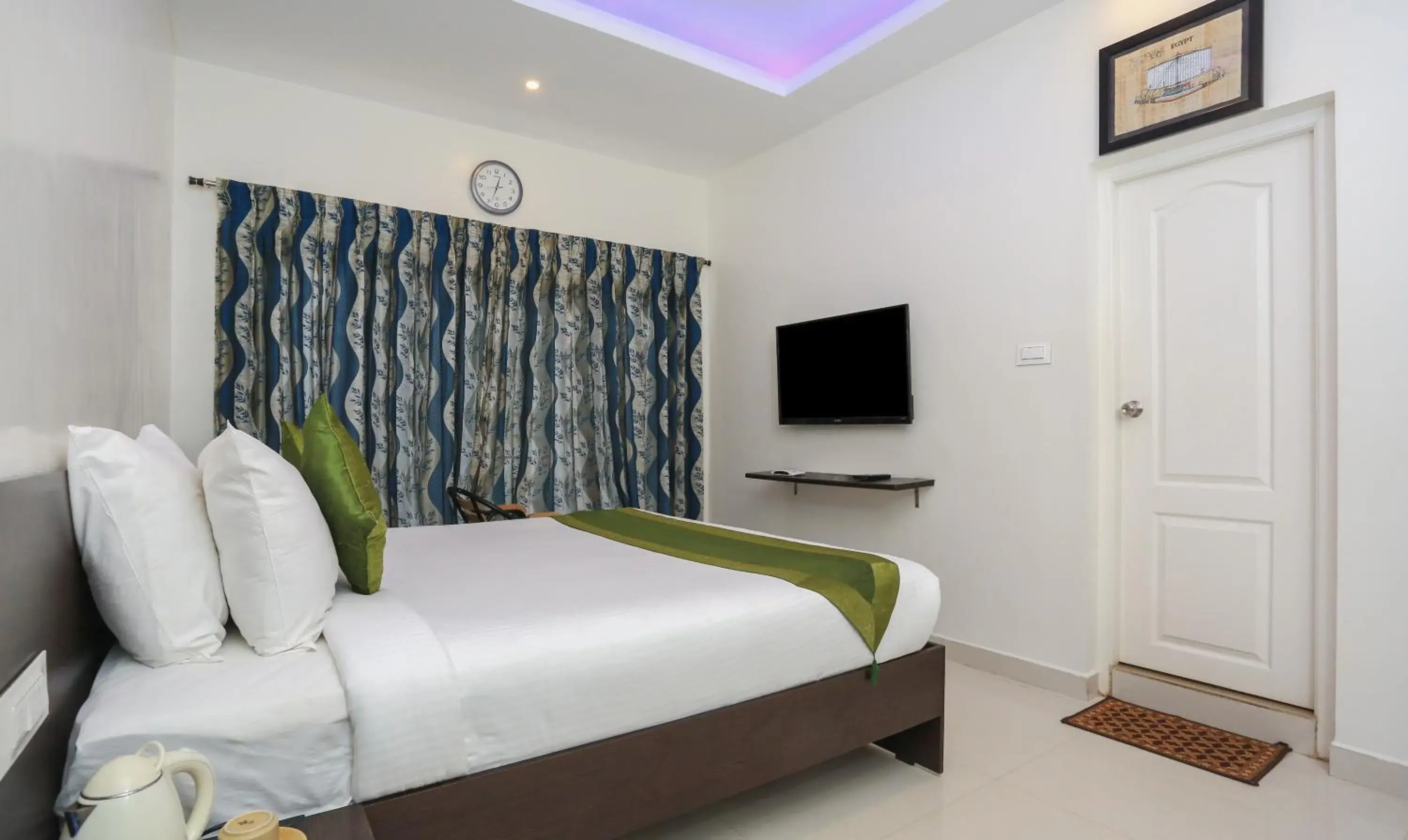 Bed in Treebo Light House, 900 Mtrs From Botanical Garden Bed in Treebo Light House, 900 Mtrs From Botanical Garden