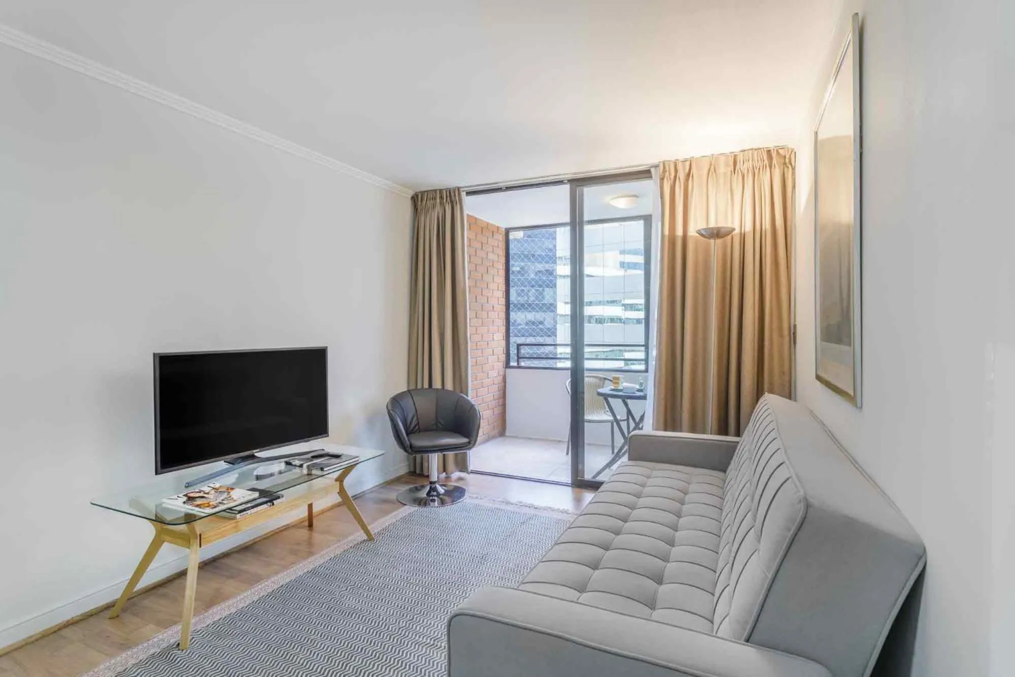 Communal lounge/ TV room in Santa Magdalena Apartments