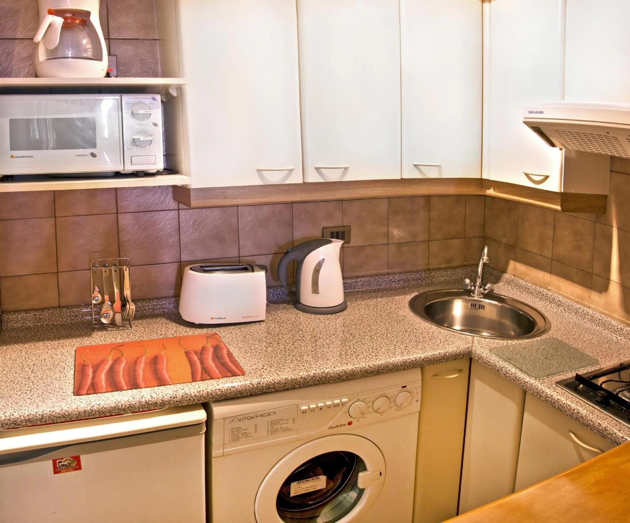 Kitchen or kitchenette in Santa Magdalena Apartments