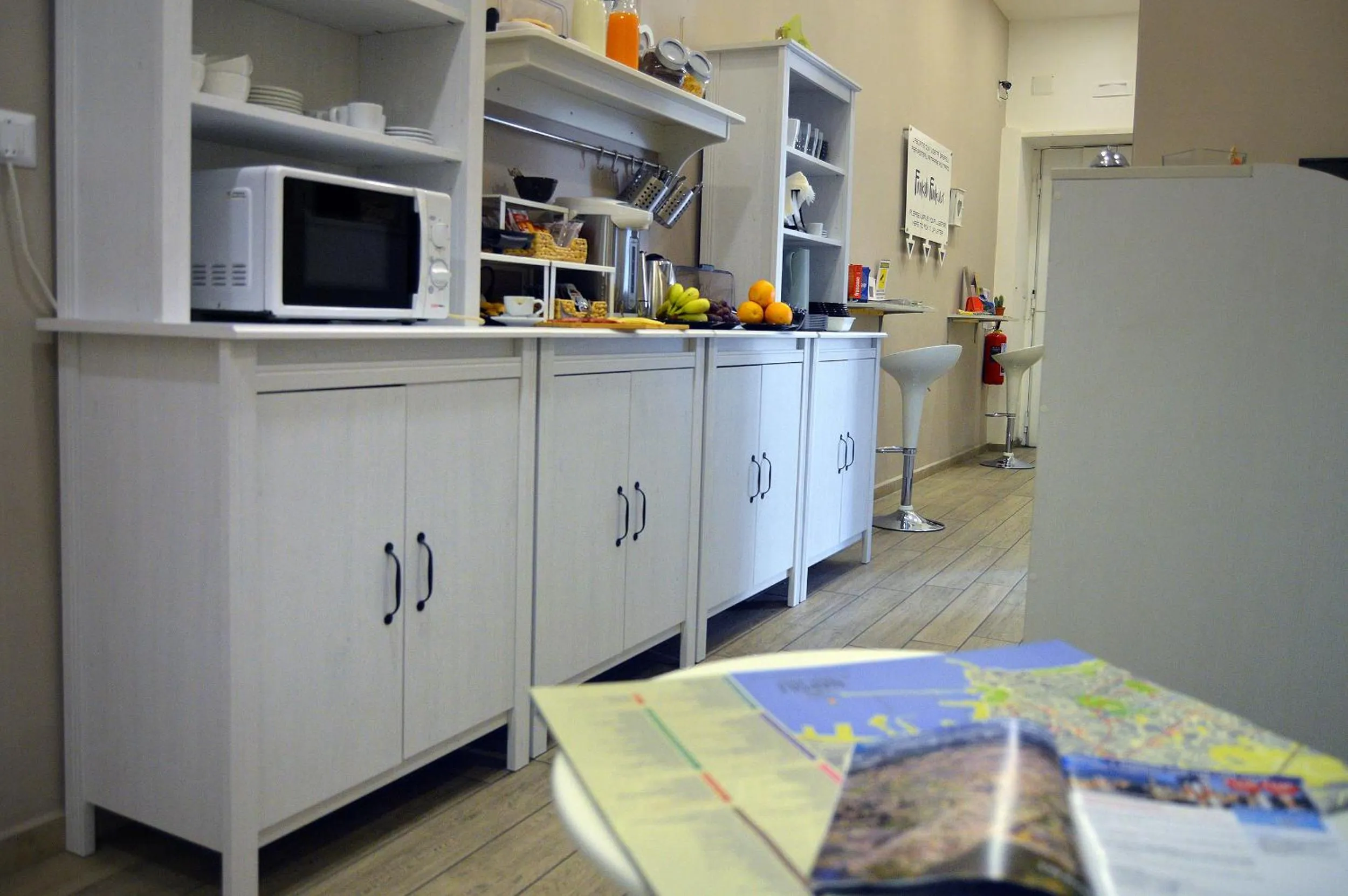 Communal lounge/ TV room in B&B Funikuli Funikula