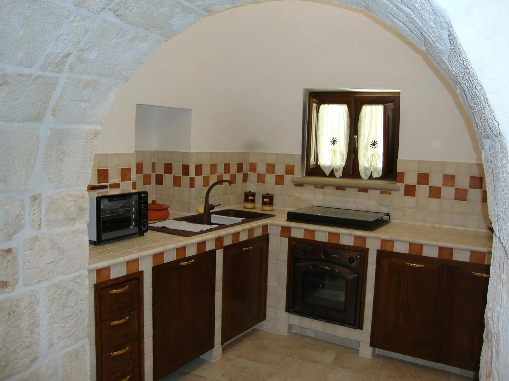 Kitchen or kitchenette in Trulli IsAgo