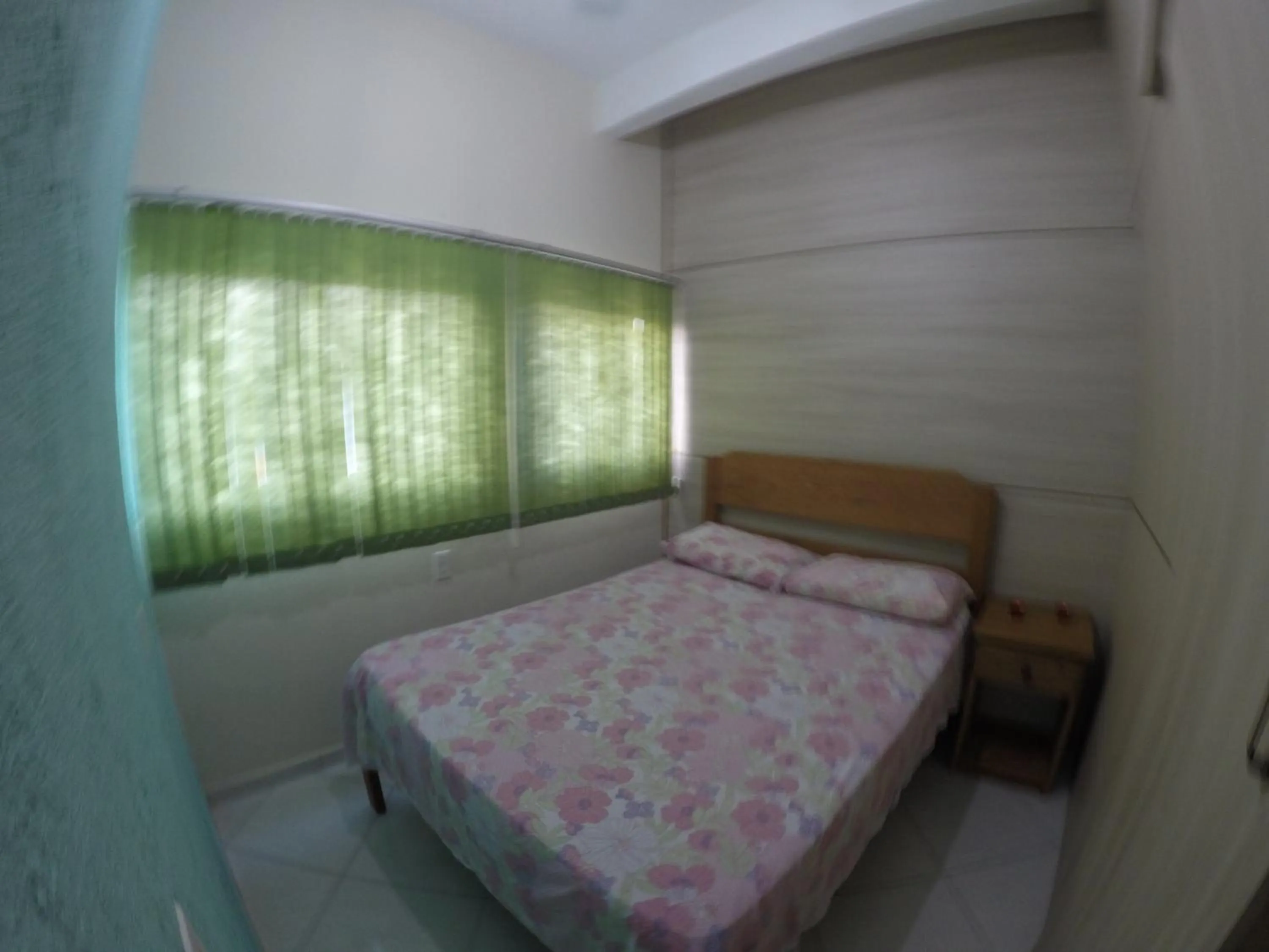 Bed in Pousada Oliveira