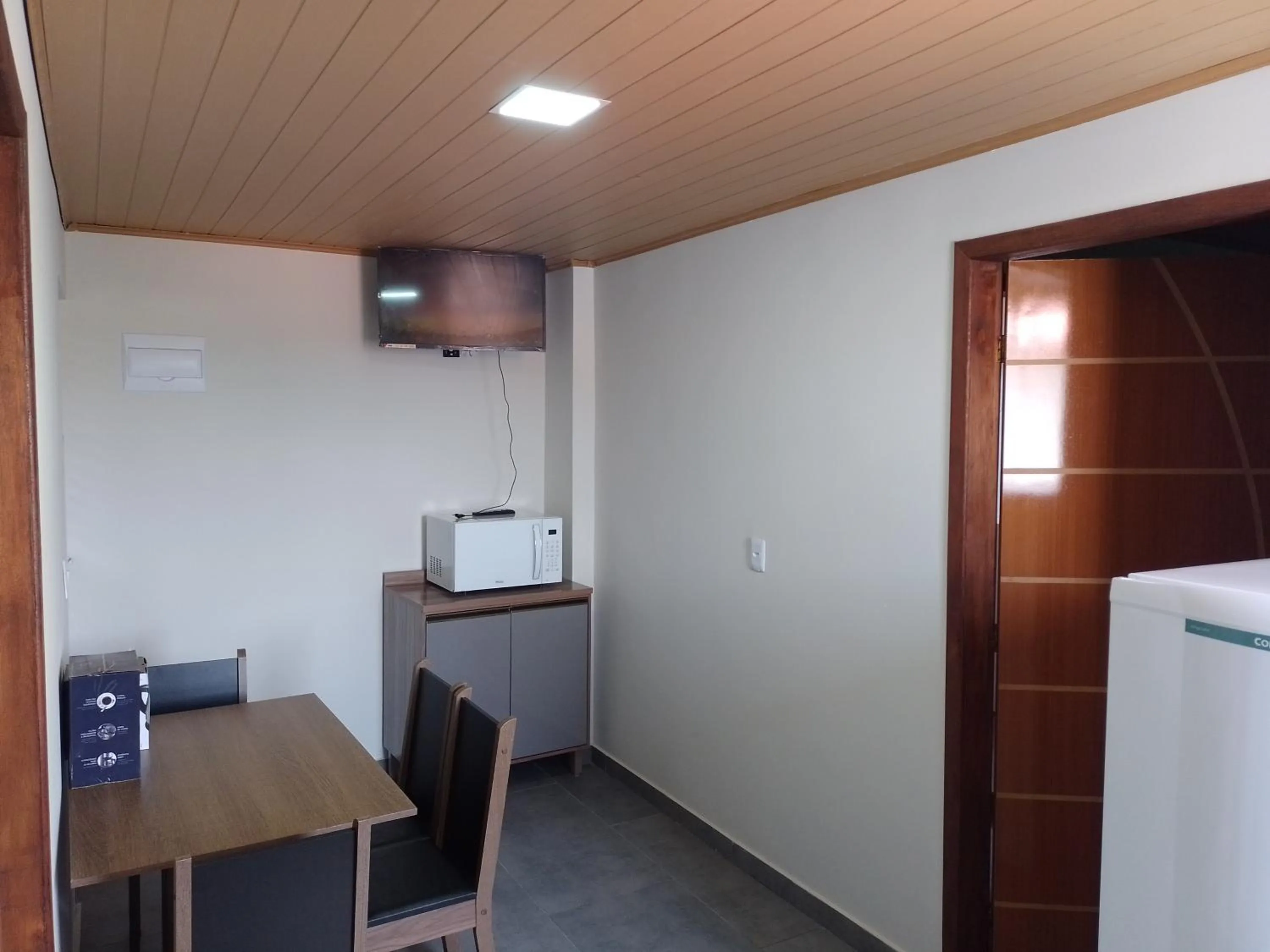 Kitchen or kitchenette in Pousada Oliveira