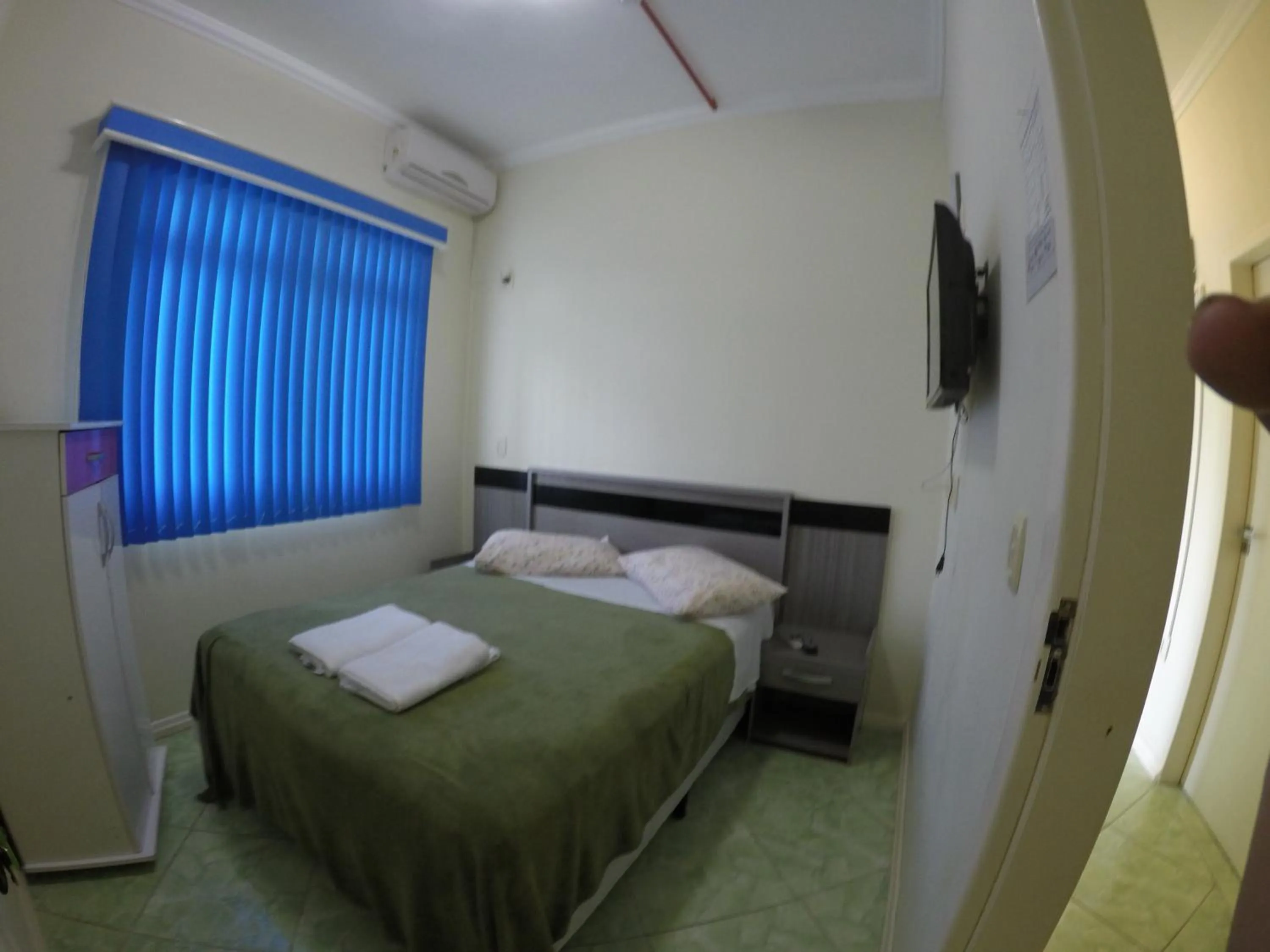 Bed in Pousada Oliveira