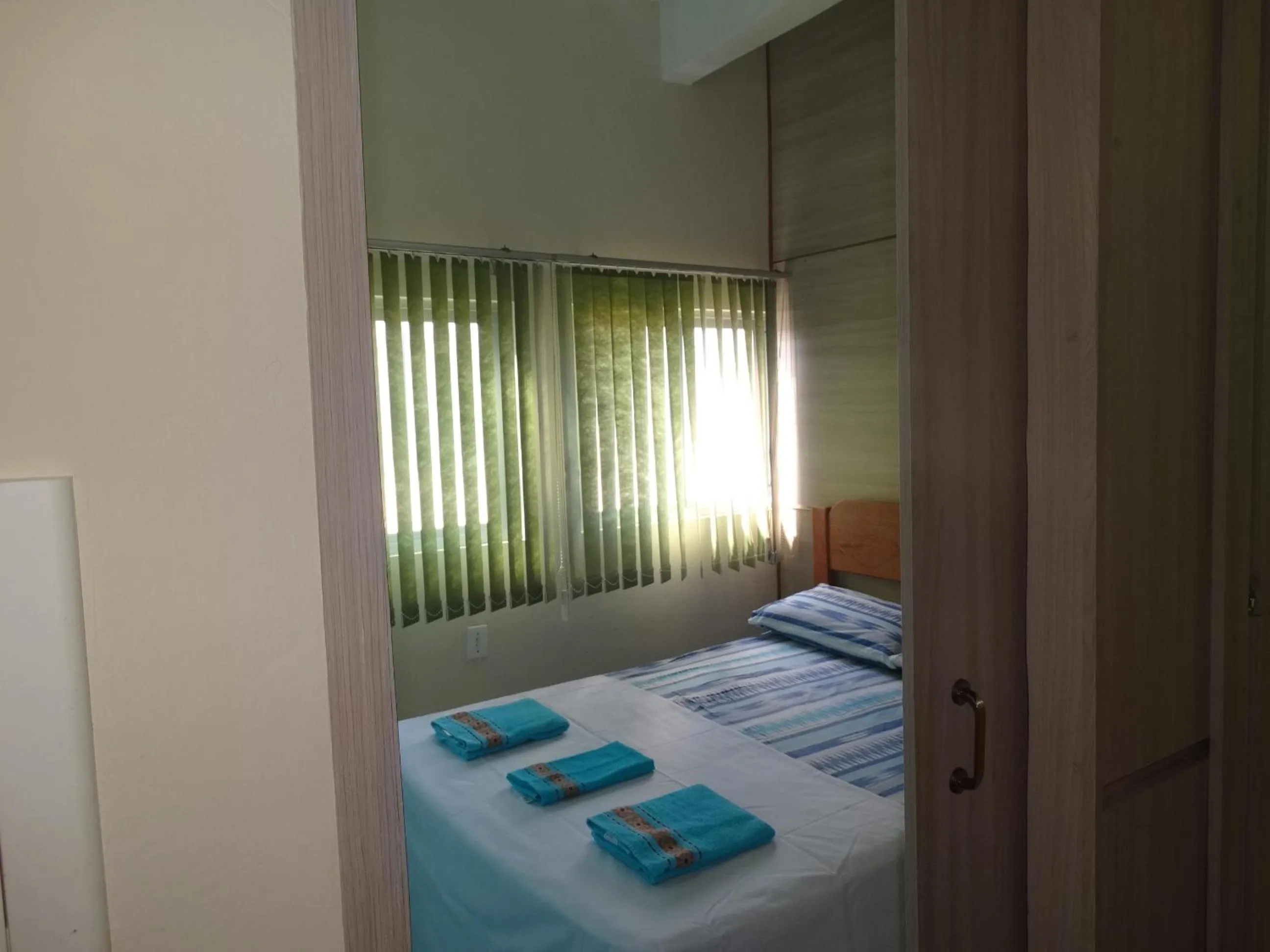 Bed in Pousada Oliveira