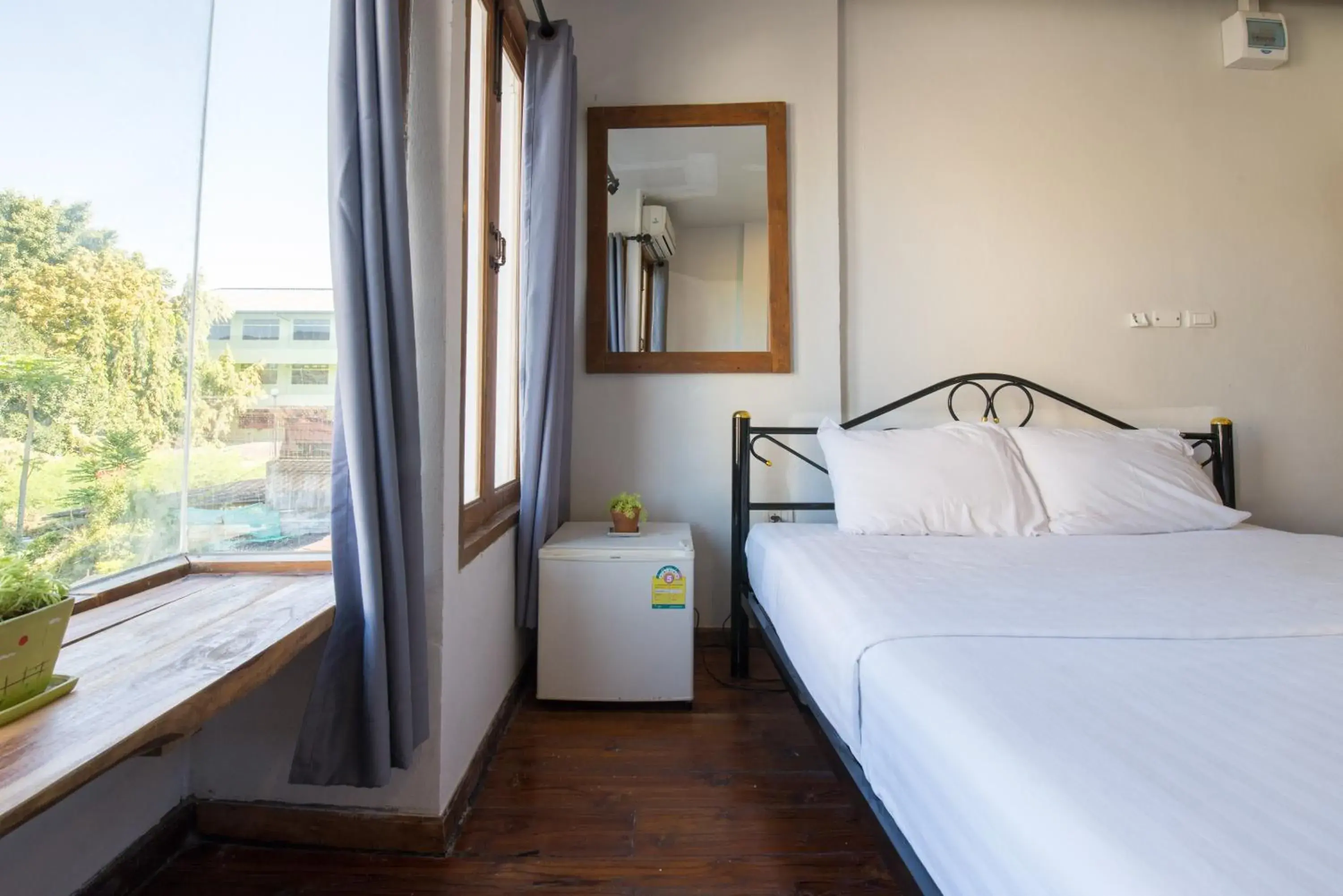 Bed in Sri Chiang Yeun House Bed in Sri Chiang Yeun House