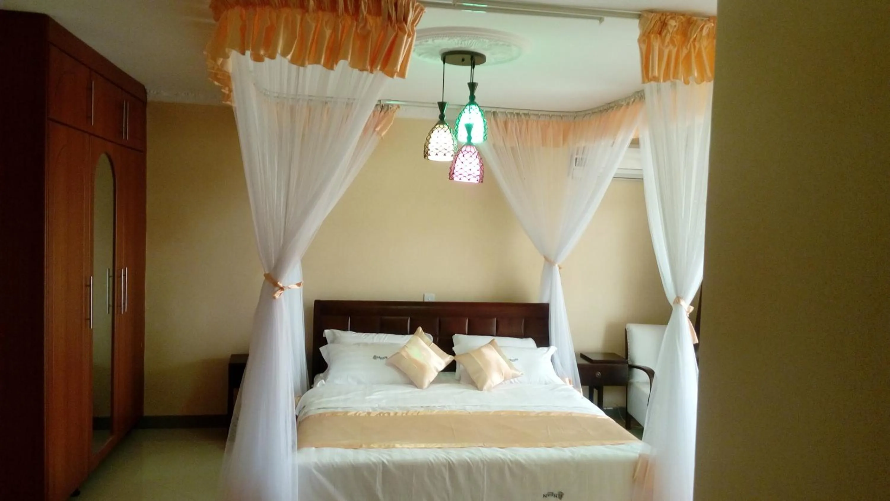 Bed in Nican Resort Hotel Seguku Entebbe