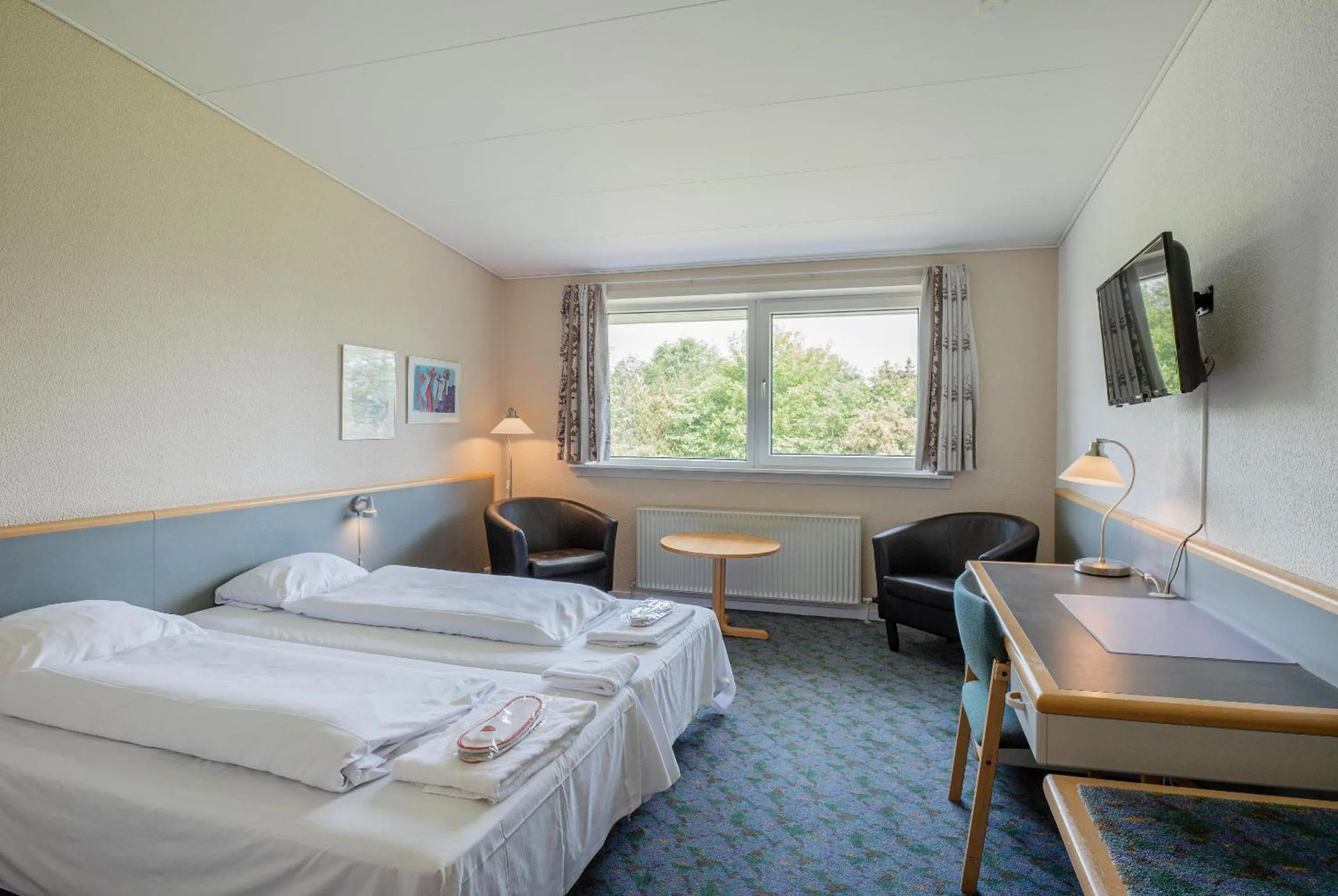 Photo of the whole room, Bed in Hotel Vissenbjerg Storkro