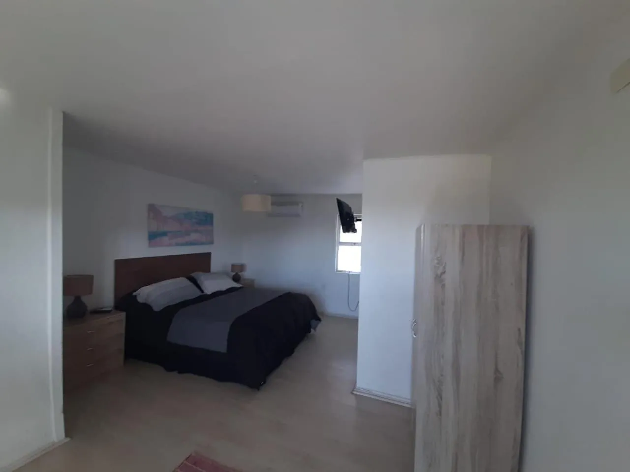 Bed in Hotel Trocadero