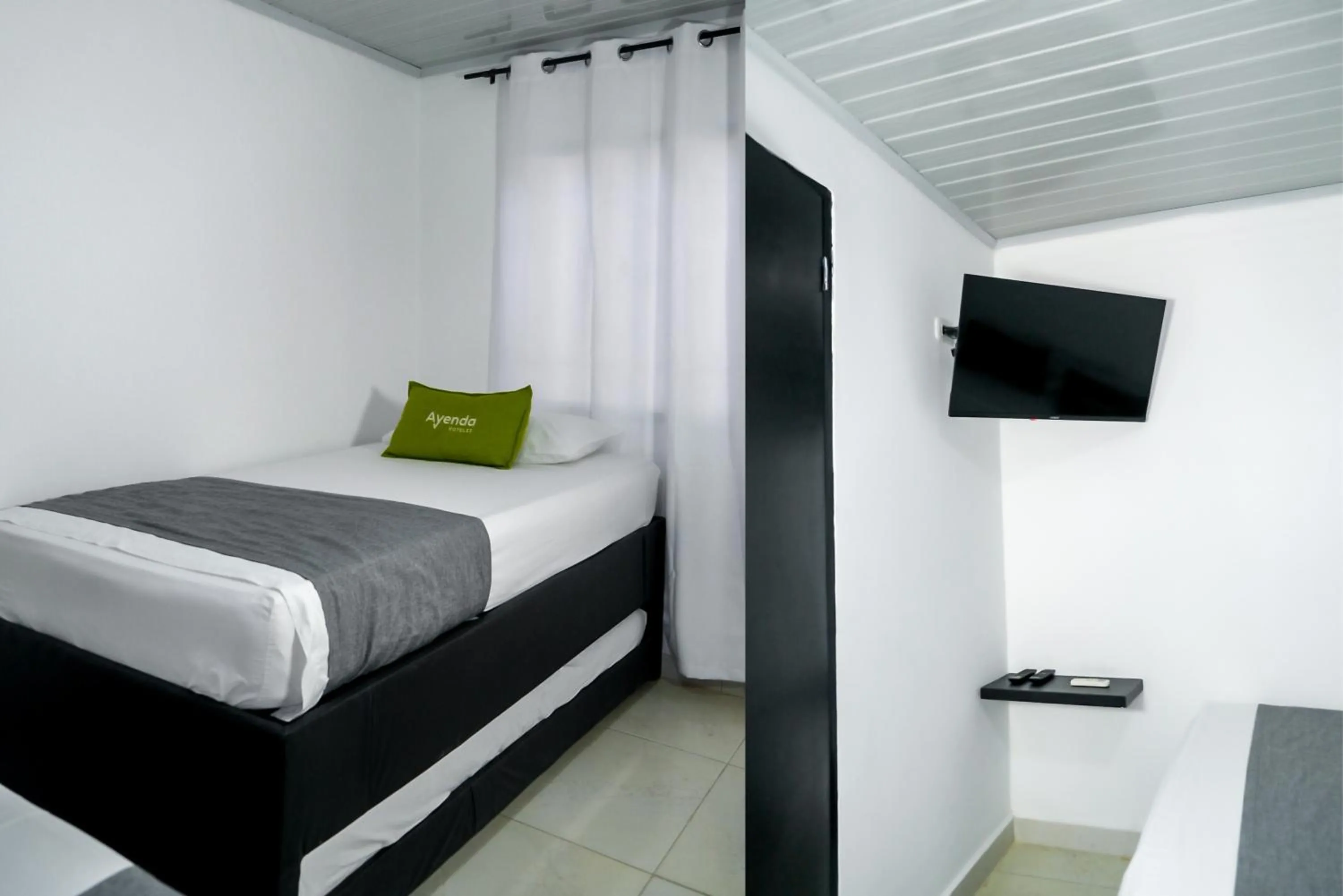 Bed in Hotel Cuchara de Palo Ayenda