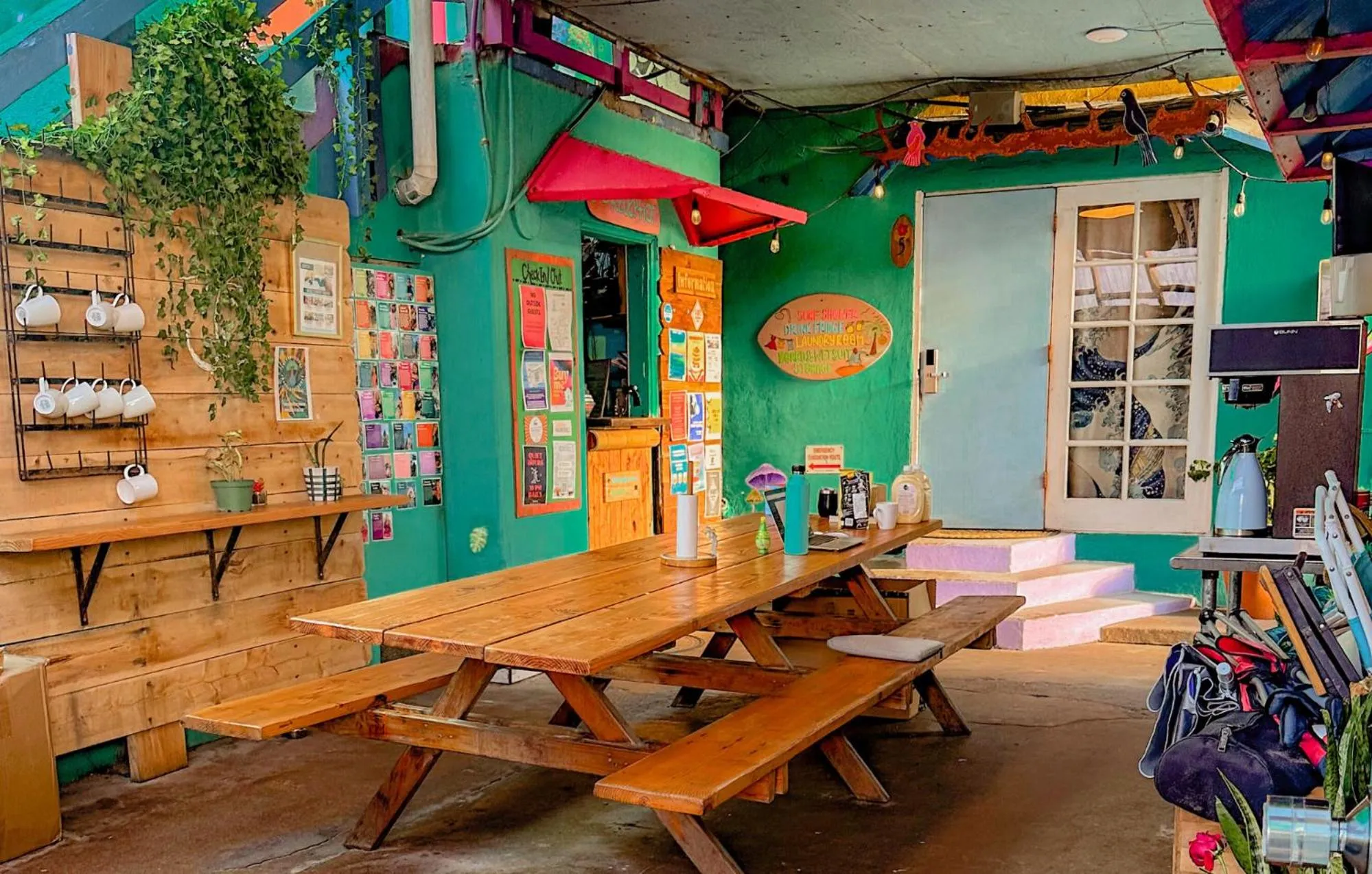 Communal lounge/ TV room in ITH San Diego Beach Bungalow Surf Hostel