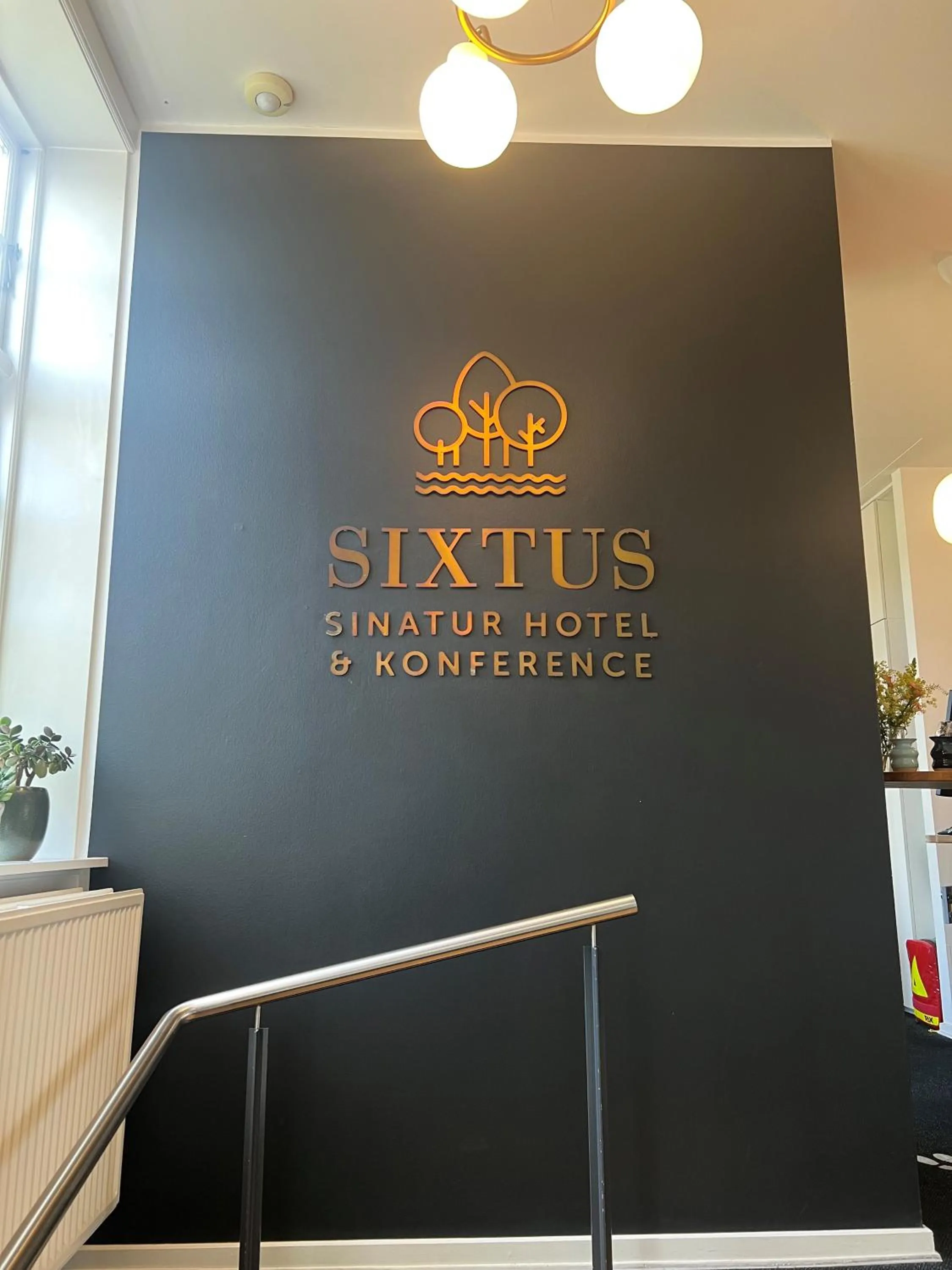 Lobby or reception in Sixtus Sinatur Hotel & Konference