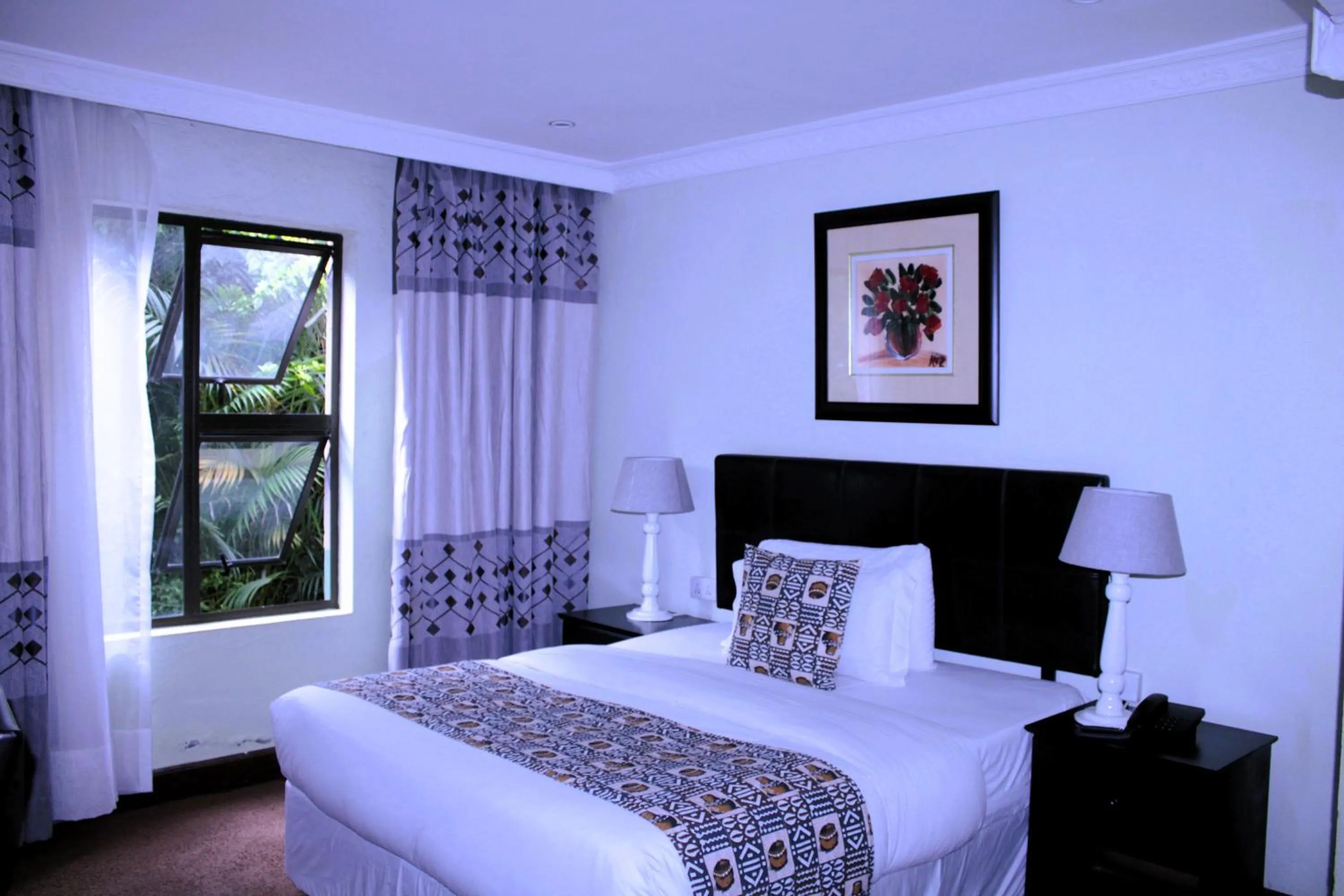 Bedroom in Zawadi House Lodge