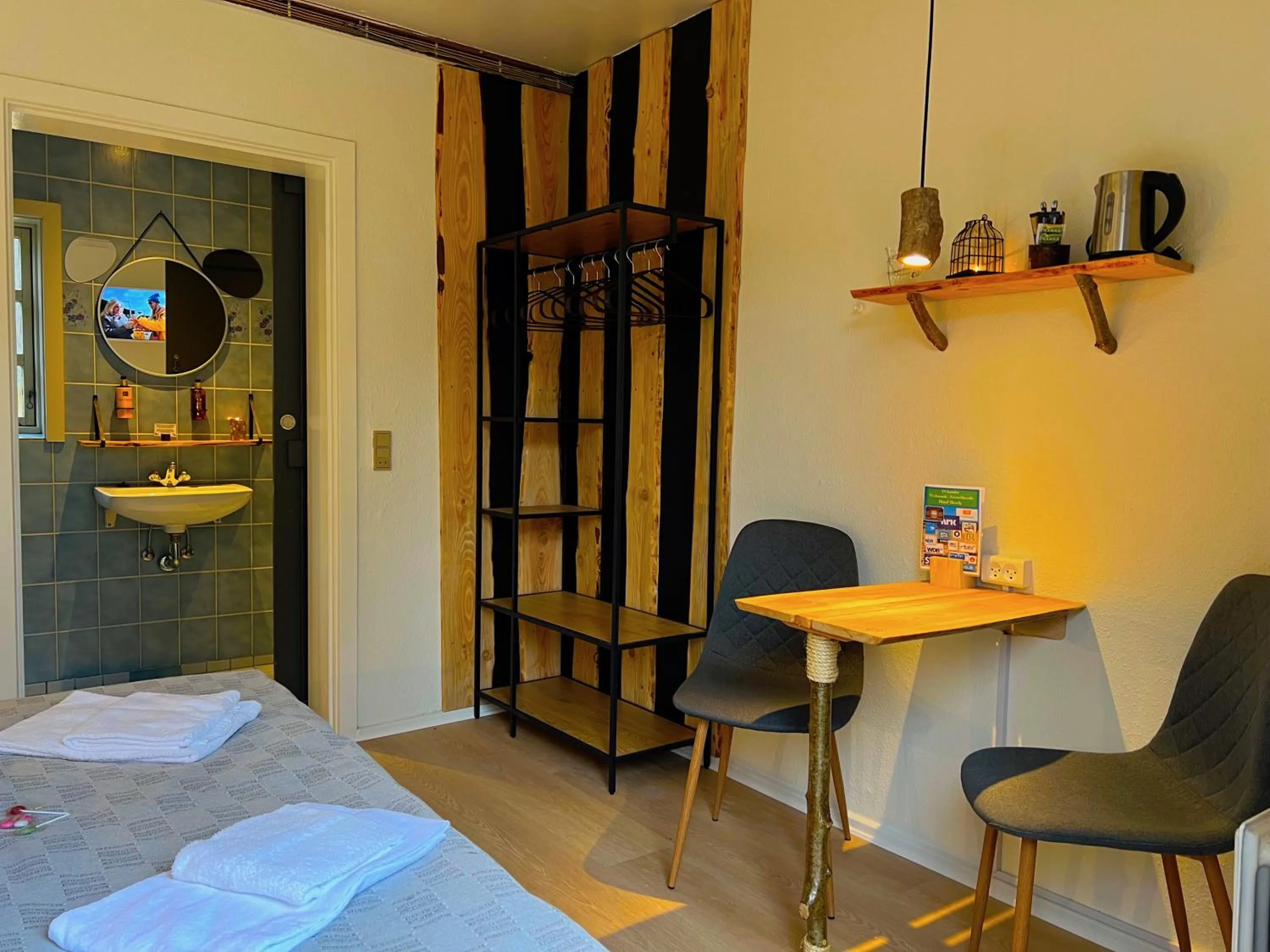 Bathroom, Bed in Hotel Skovly