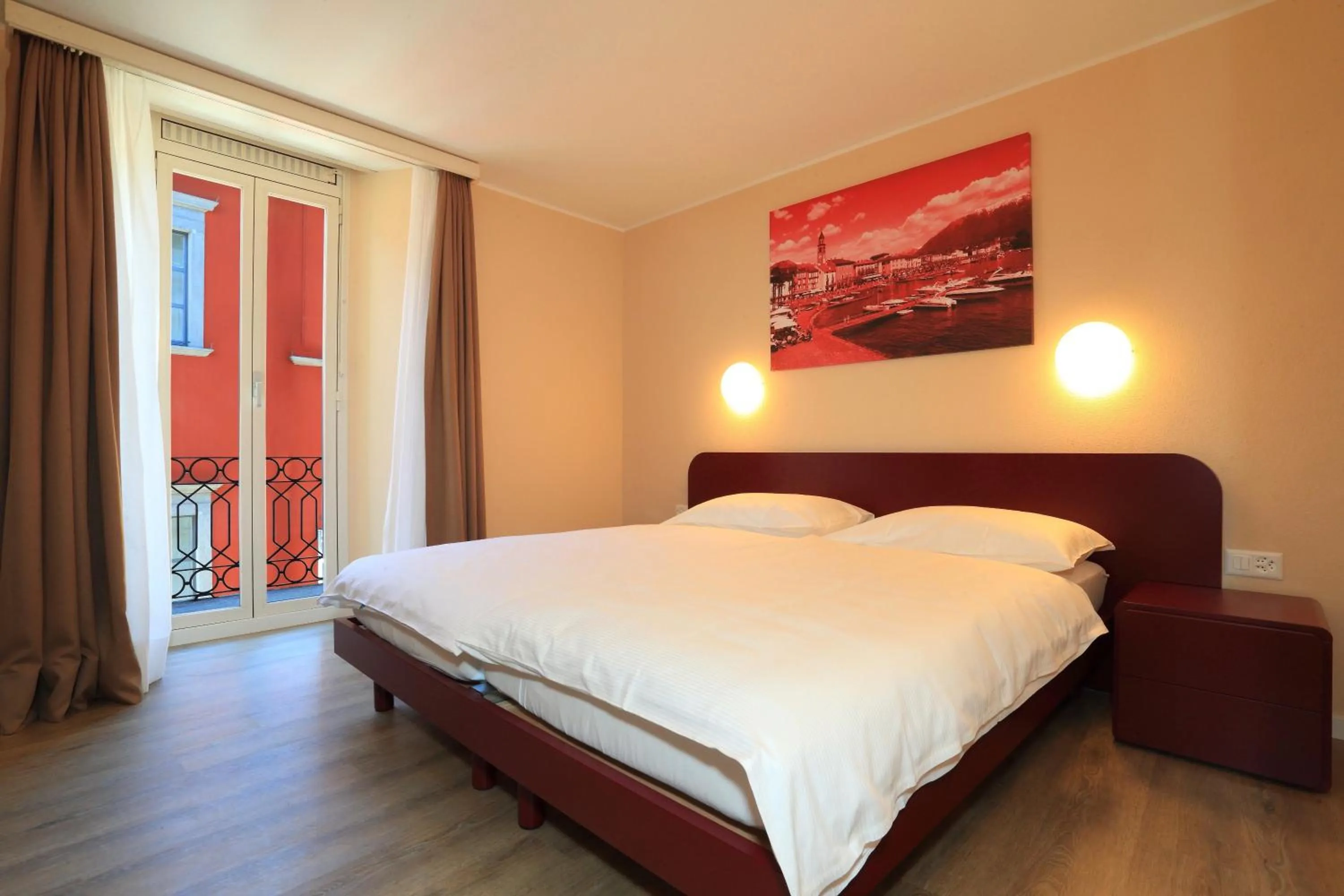 Property building, Bed in Hotel Elvezia Ascona