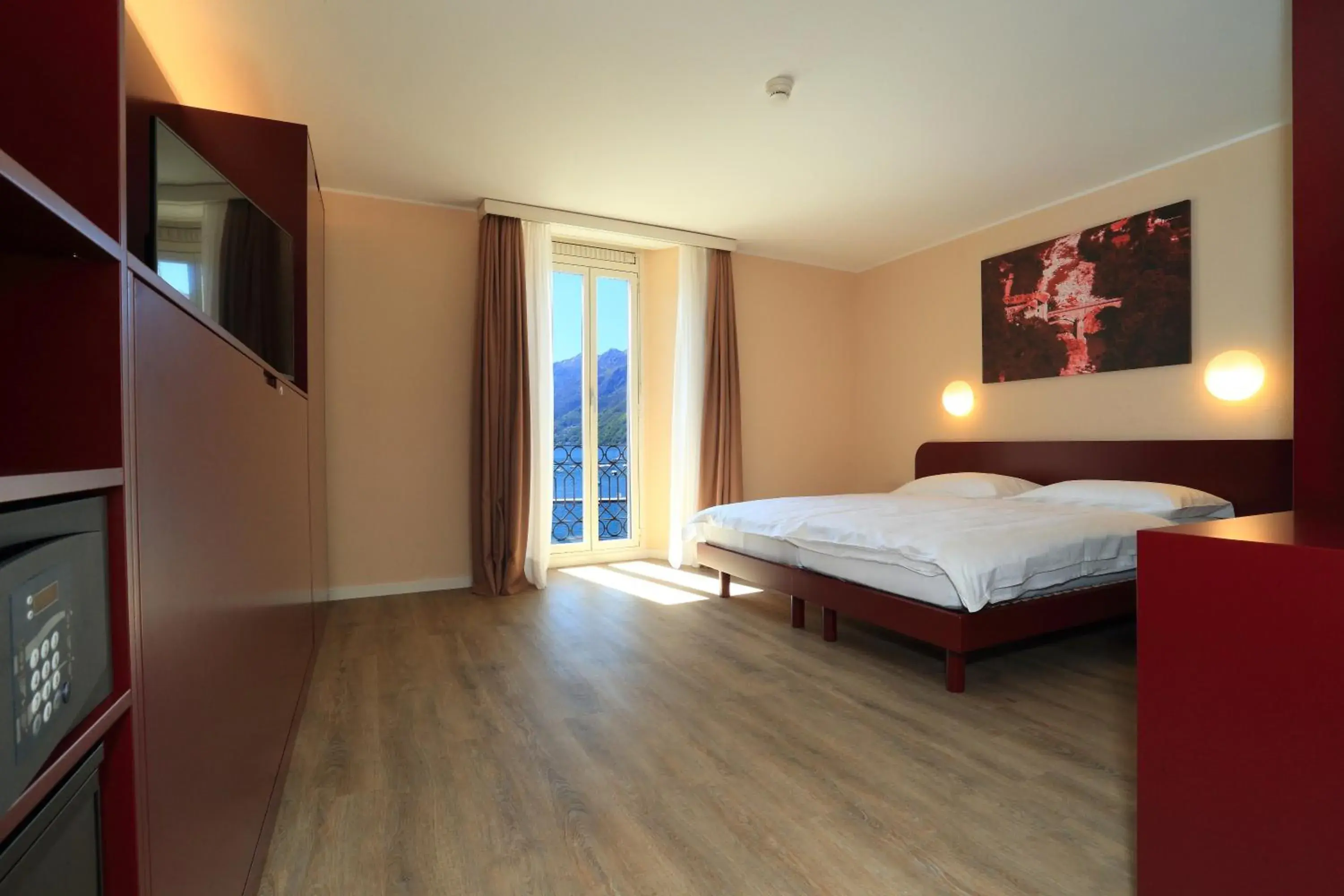 Photo of the whole room, Bed in Hotel Elvezia Ascona Photo of the whole room, Bed in Hotel Elvezia Ascona