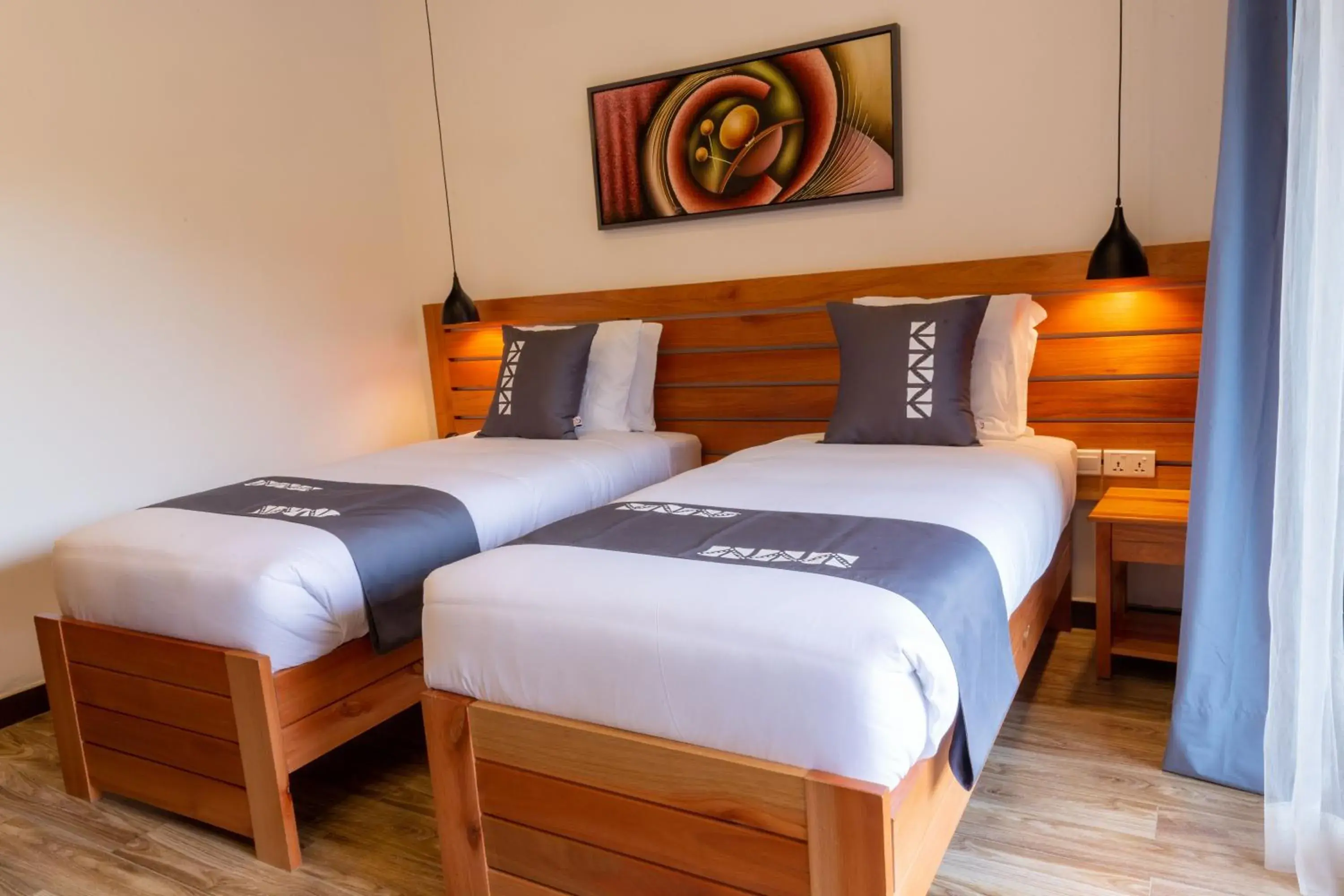 Deluxe Double Room with Two Double Beds in Hotel Chez Lando Deluxe Double Room with Two Double Beds in Hotel Chez Lando