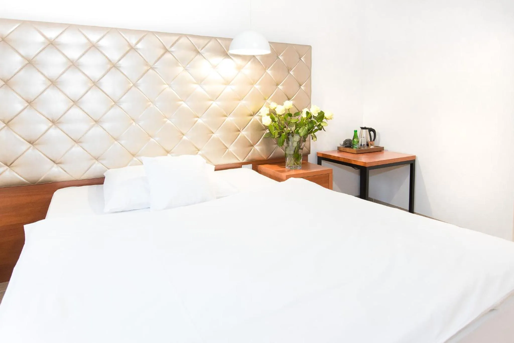 Bed in Europejski Boutique Hotel